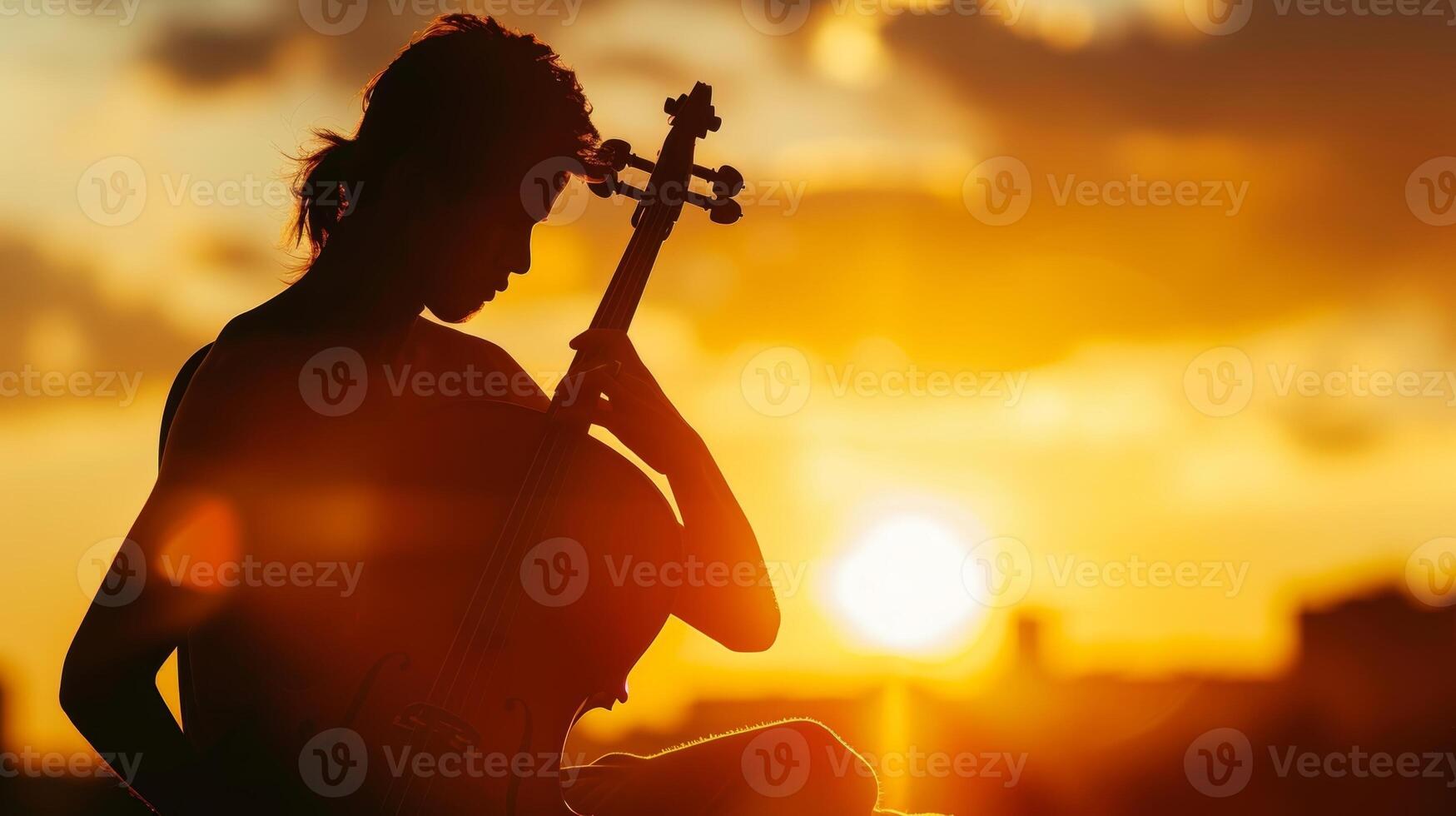A silhouetted figure of a person playing a musical instrument against a sunset sky symbolizing the power of music to improve cognitive function photo