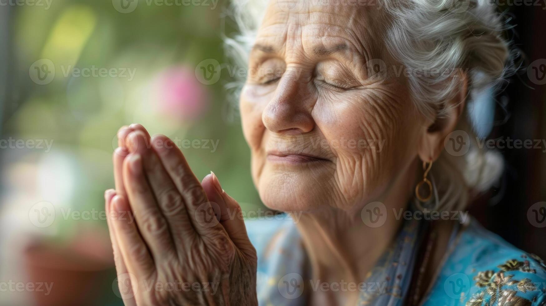 A senior practicing lovingkindness meditation cultivating feelings of compassion and wellbeing towards themselves and others photo