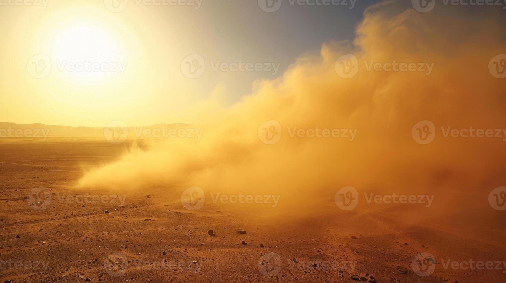 The scorching sun beating down on the desert creating the perfect conditions for dust devils to form photo