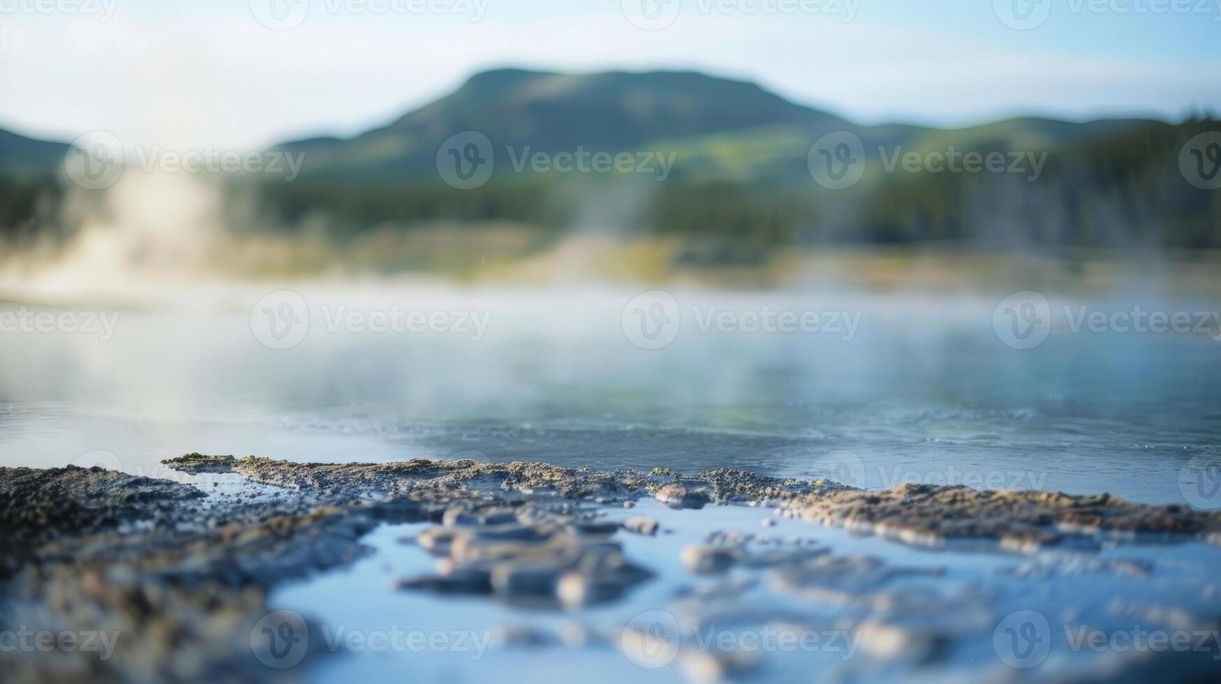 A landscape dotted with geothermal pools each with its own unique color photo