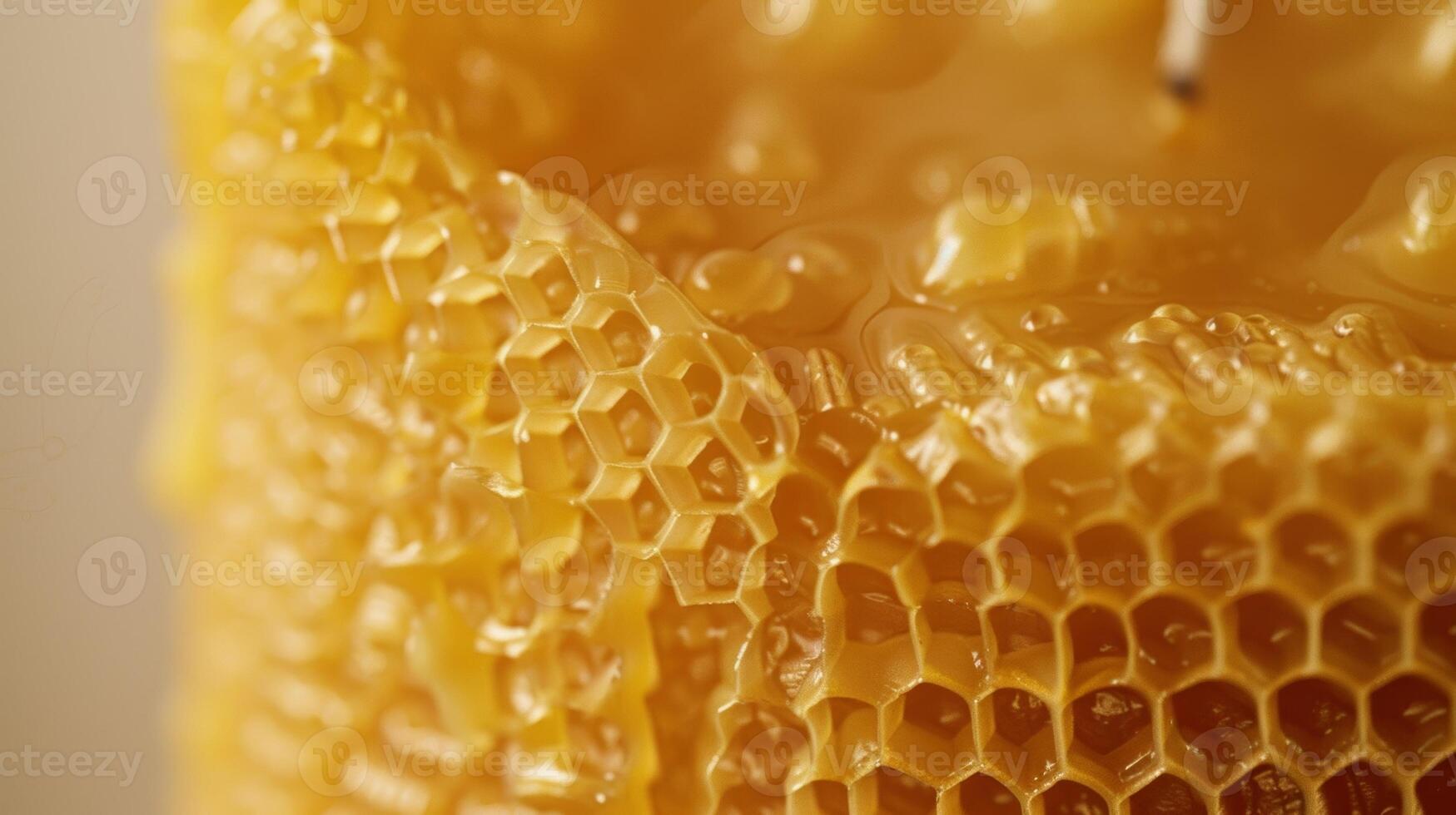The soft and pliable texture of a newly lit beeswax candle with its distinct waxy scent wafting through the air photo