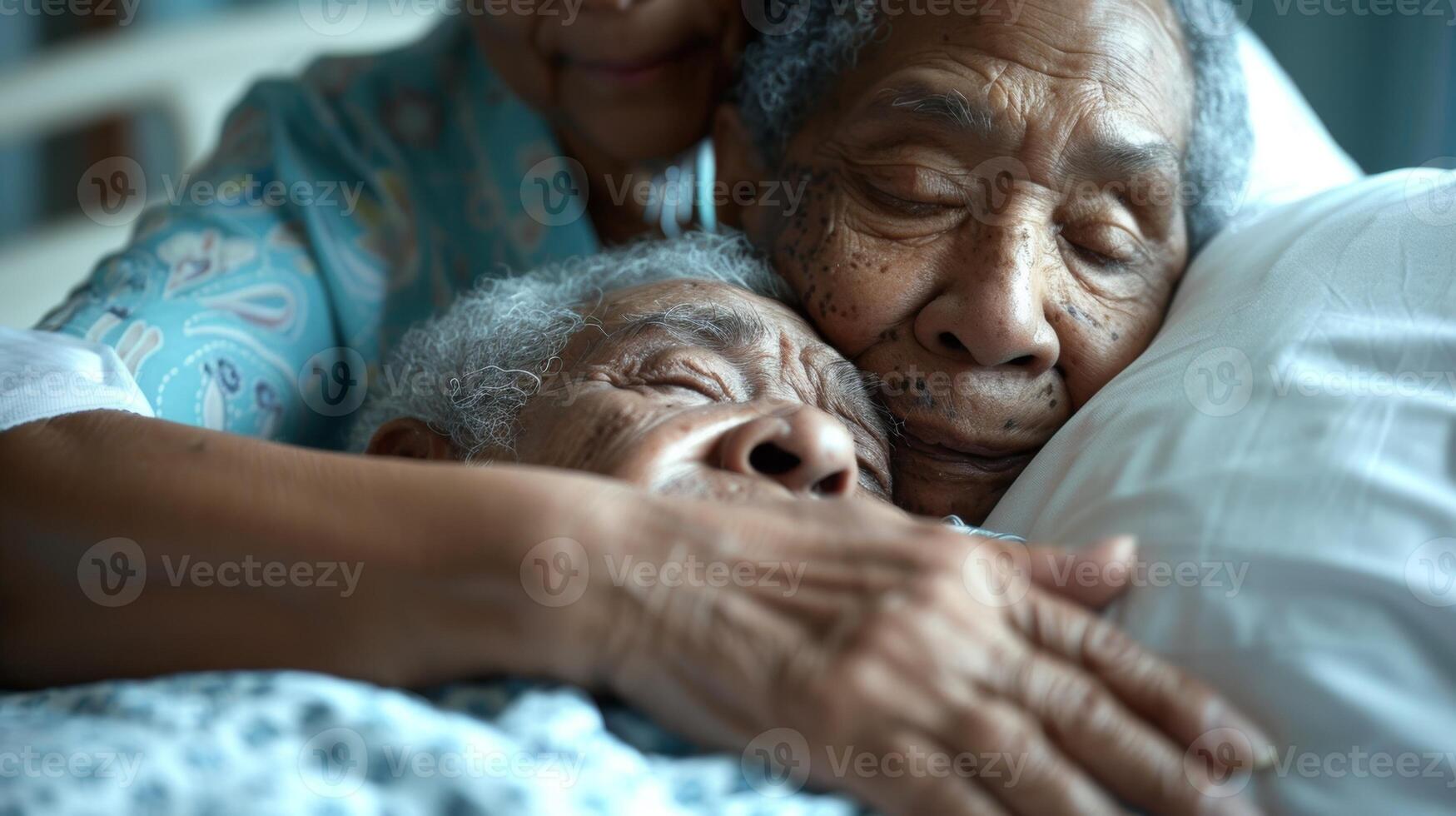 A comforting hug shared between a caregiver and their elderly patient in bed photo