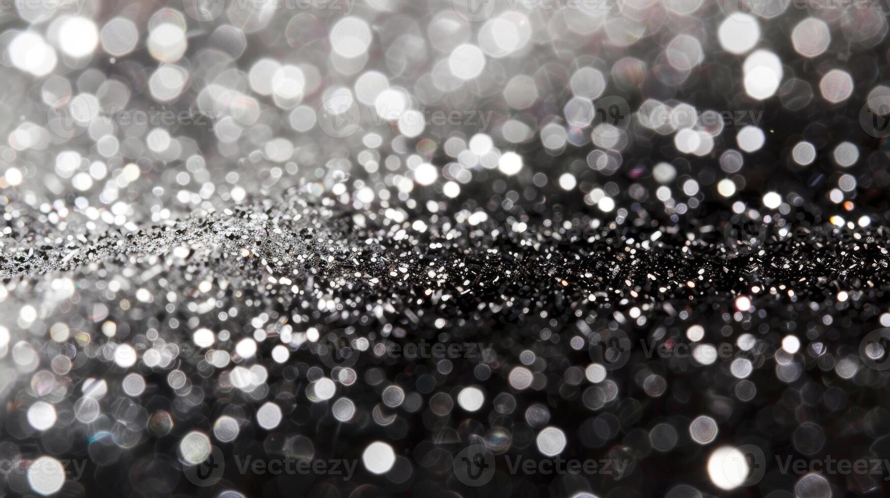 Flecks of sparkling crystals are tered a the dull monotone surface creating a contrast of light and dark that draws the eye photo