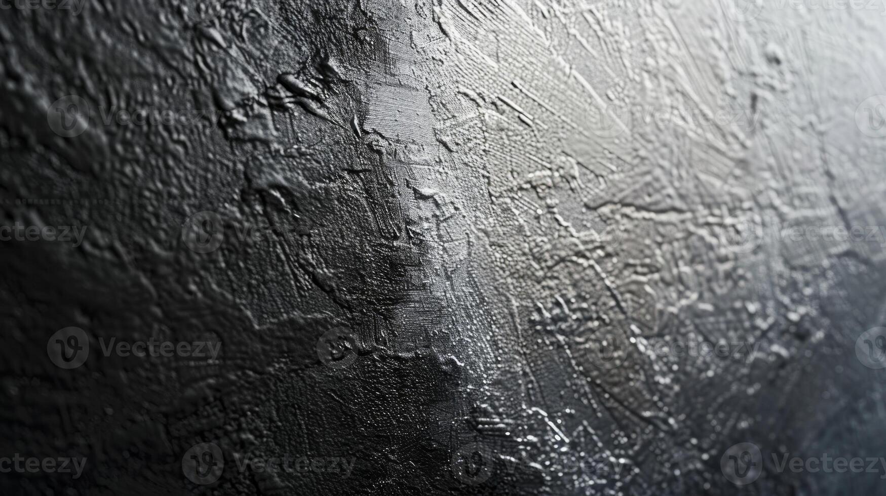 A closeup of metallic paint with a subtle gradient transitioning from a deep black to a gleaming silver photo