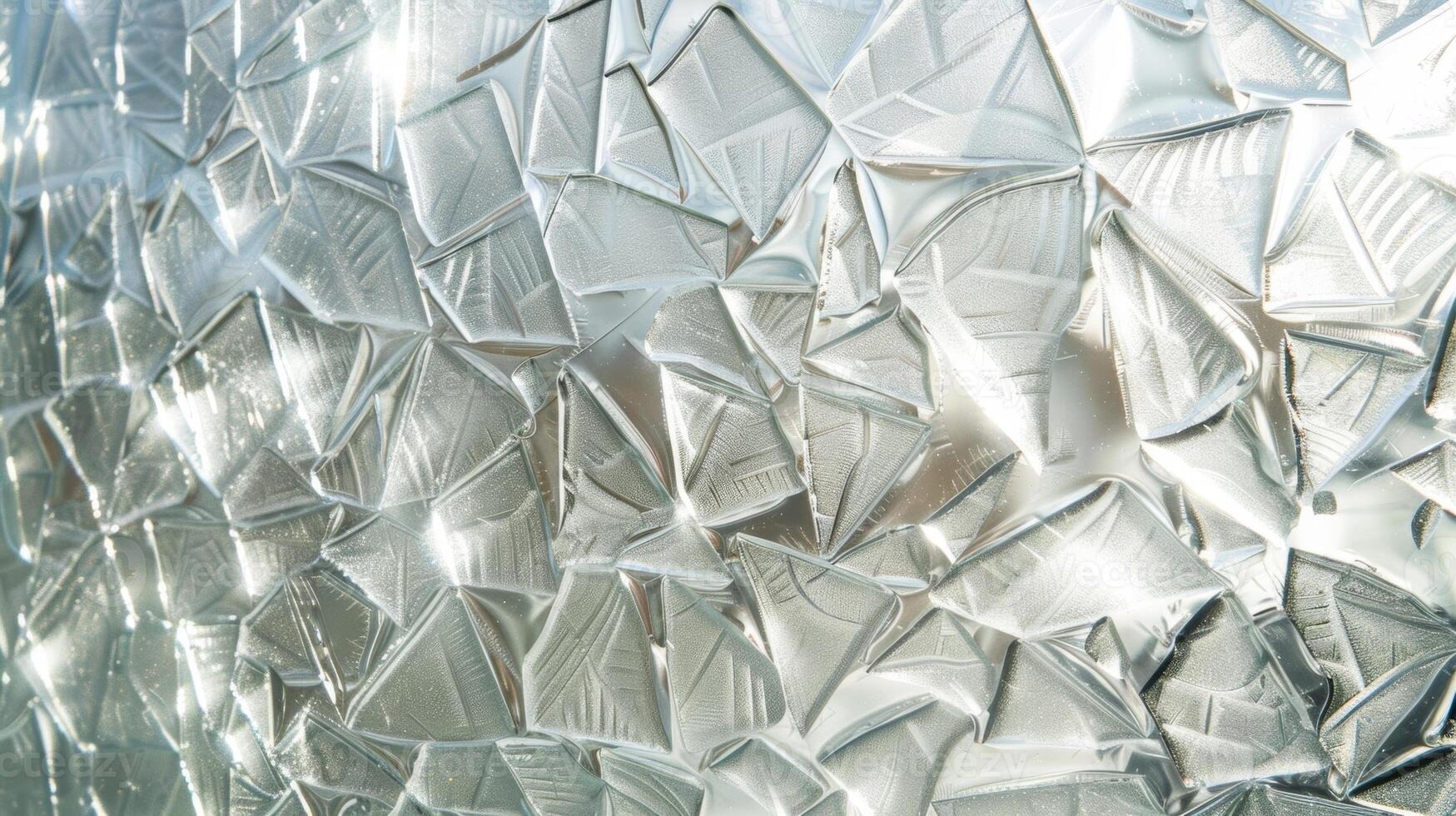 Icy Mosaic The frost forms a mosaiclike pattern on the glass each piece uniquely shaped and reflecting light in different ways photo