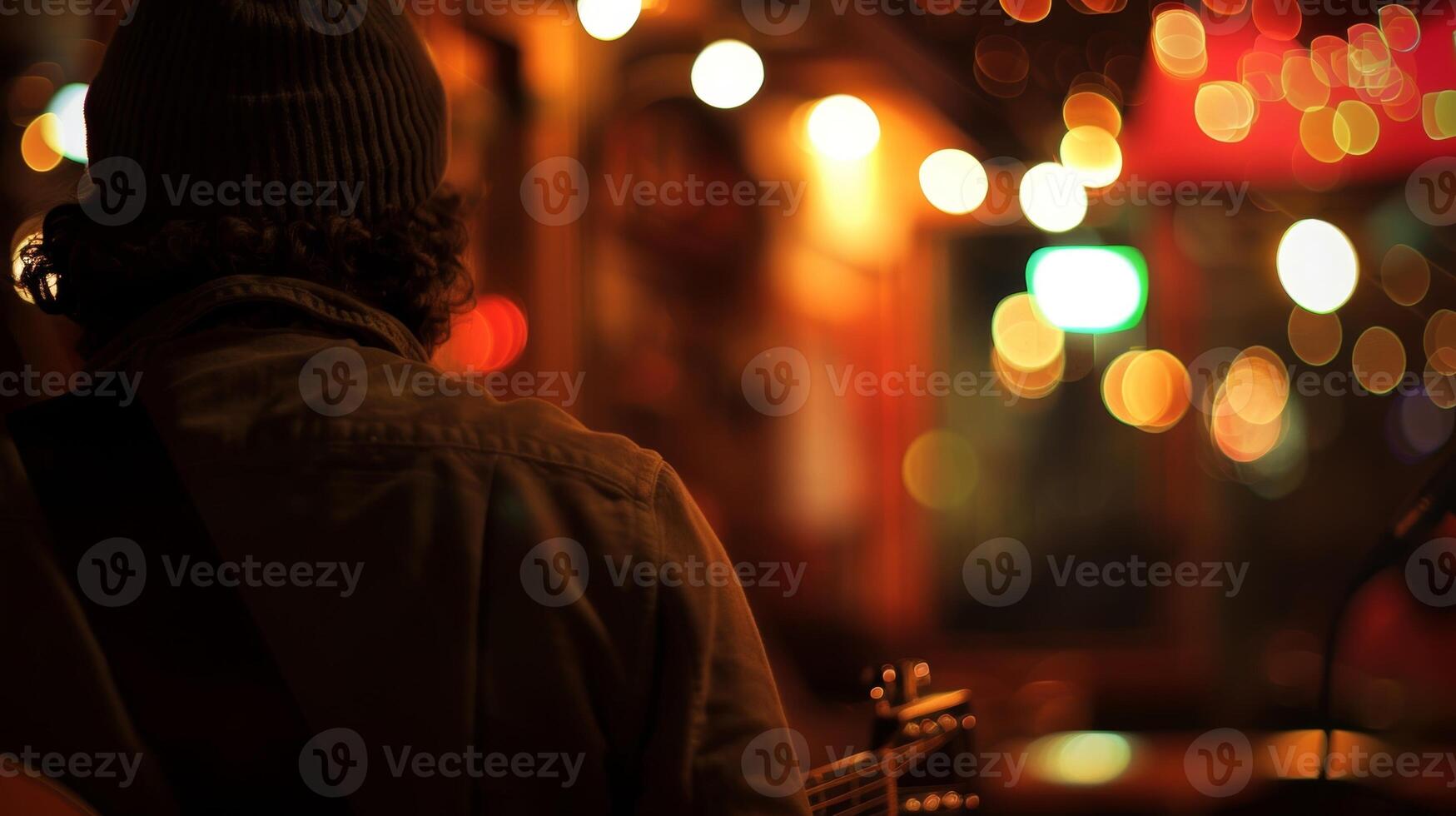 Soft edges and outoffocus details create an air of mystery and anticipation at this open mic night photo