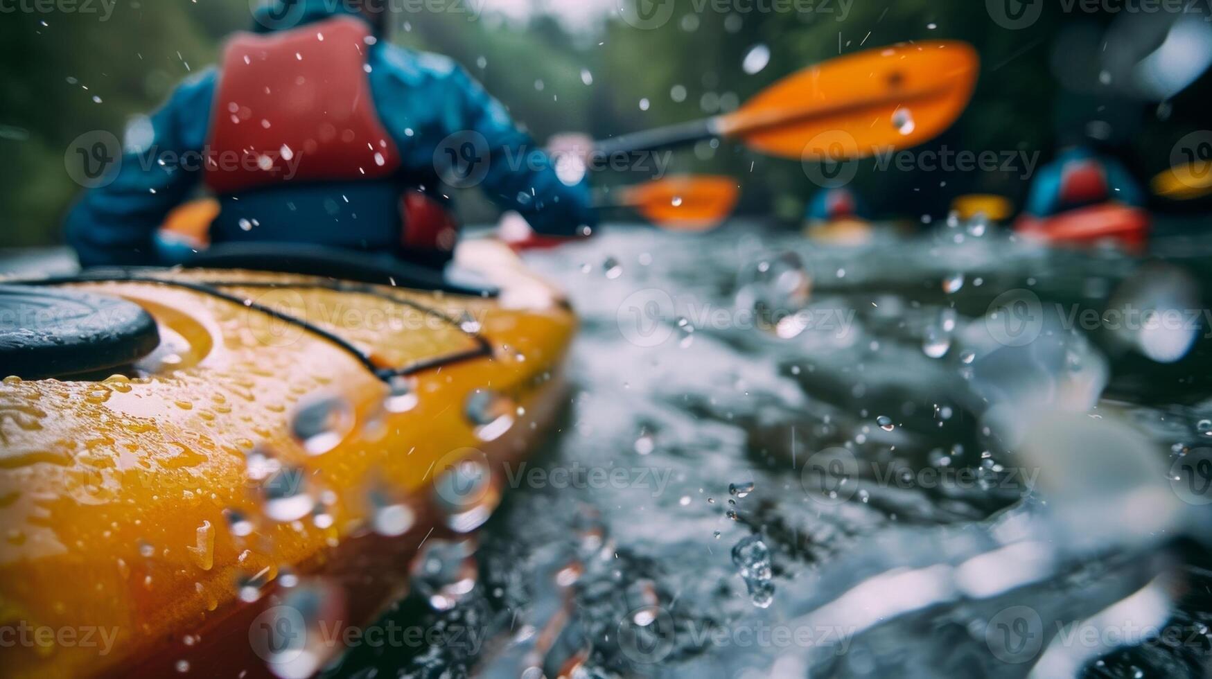 Defocused kayakers paddling through rough waters in a challenging outdoor sport photo