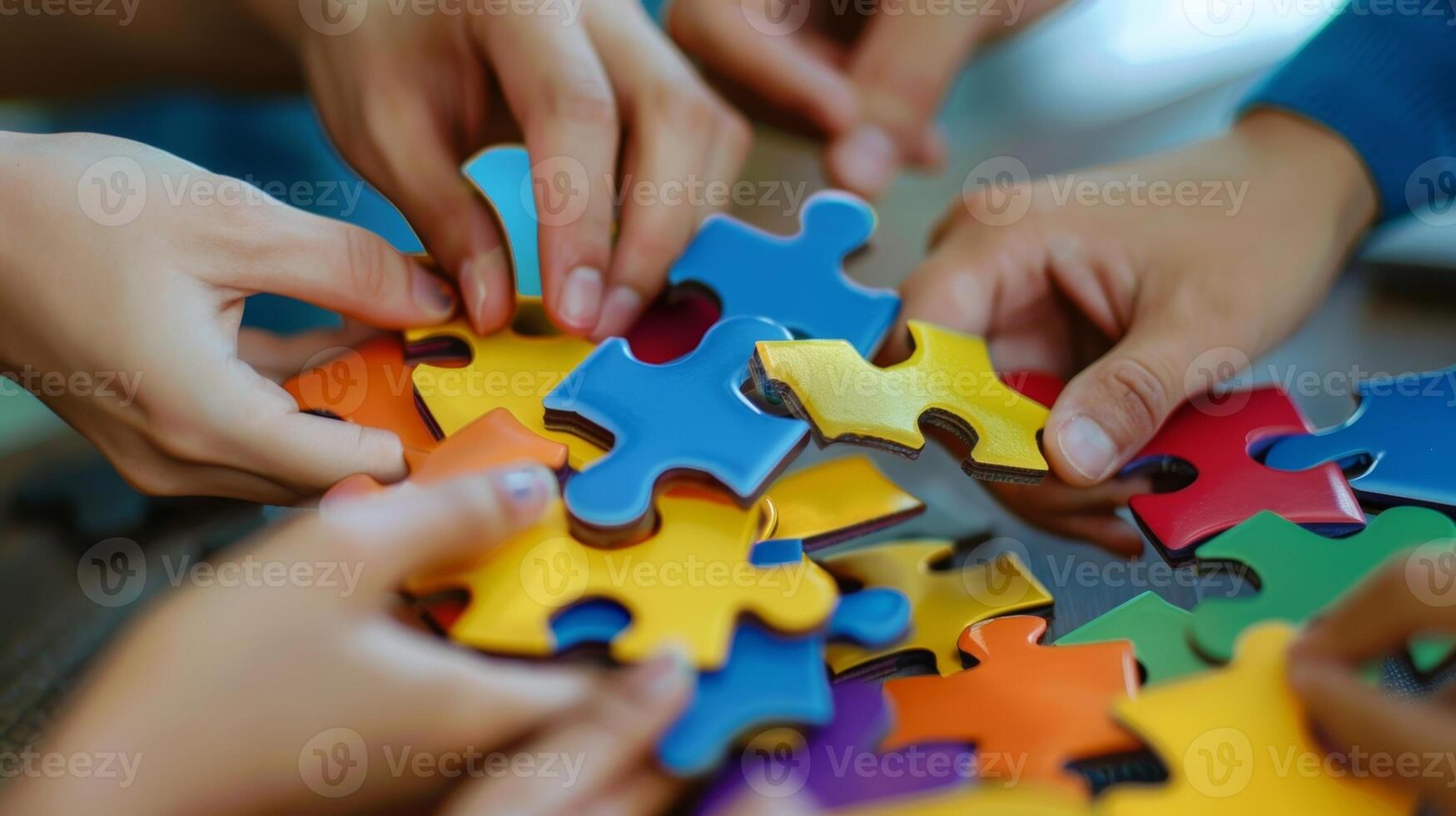 Defocused image of a team working together in a problemsolving exercise photo