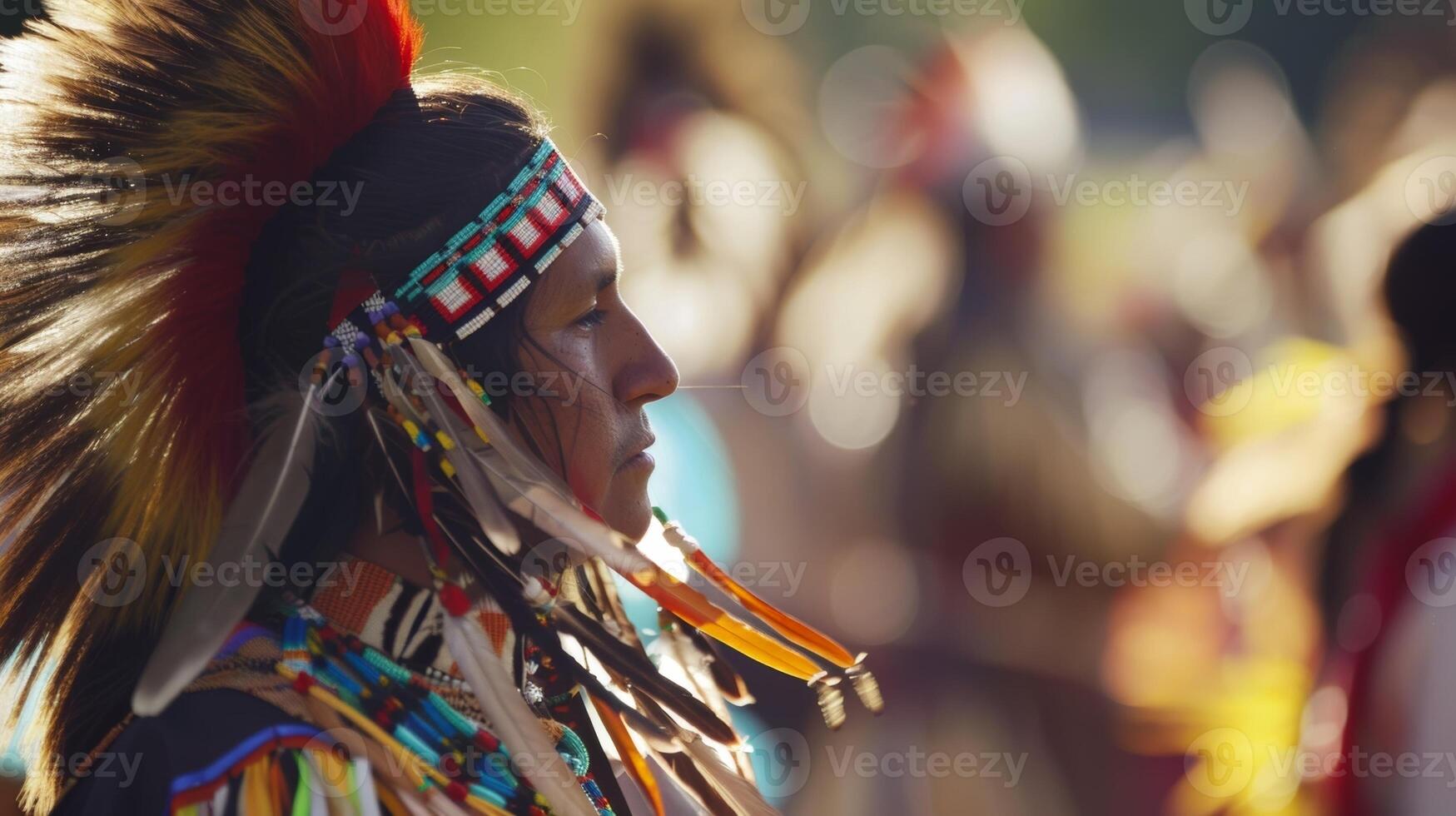 Out of focus depiction of Native Americans performing a traditional dance in historical attire photo