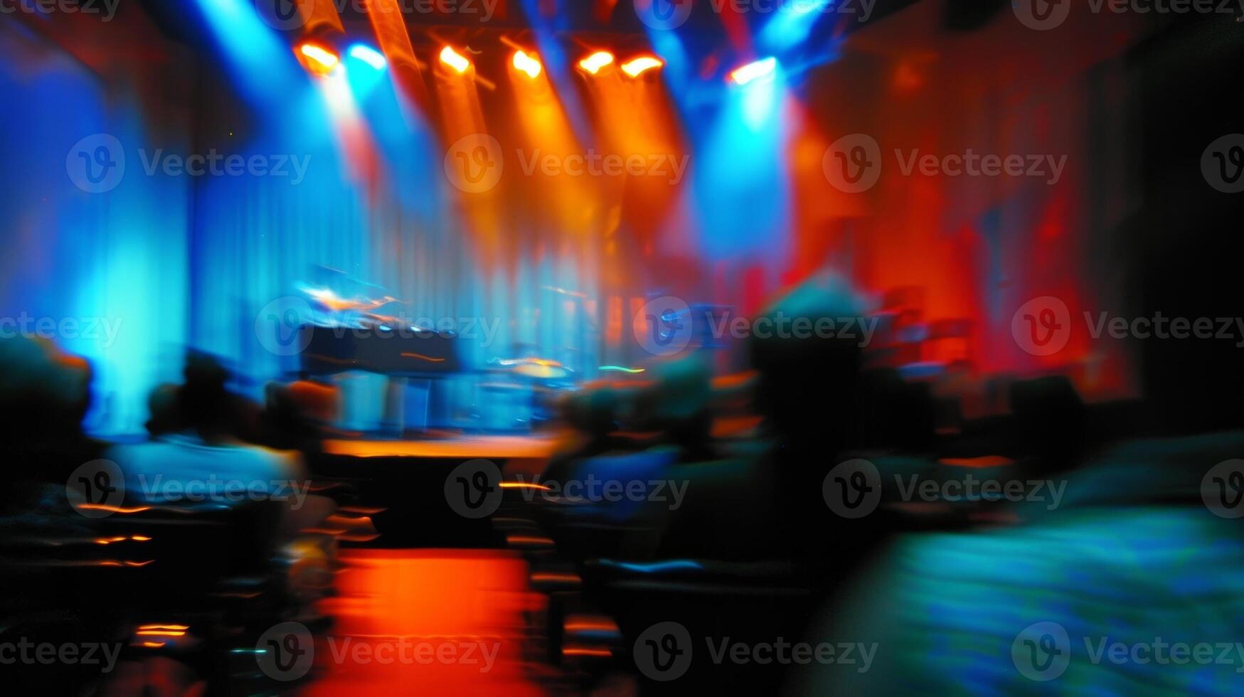 The stage was a distant blur as the audience leaned in to catch every word photo