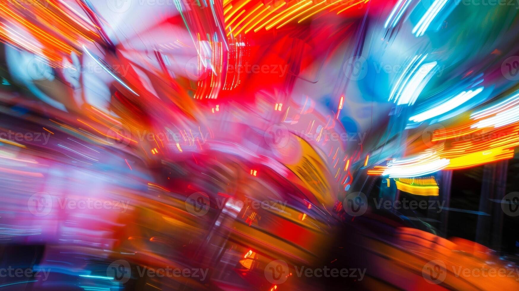 A carnival of blur and motion with rides whizzing past in every direction photo