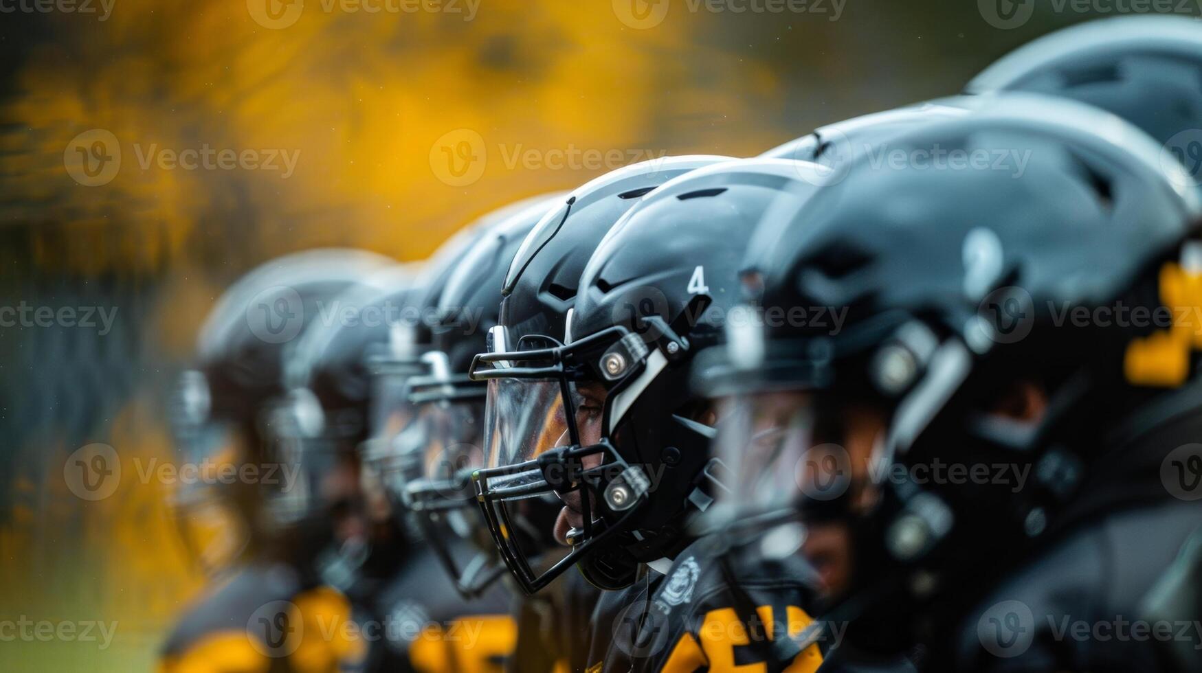 A vague view of players huddled together strategizing for an upcoming game during practice photo