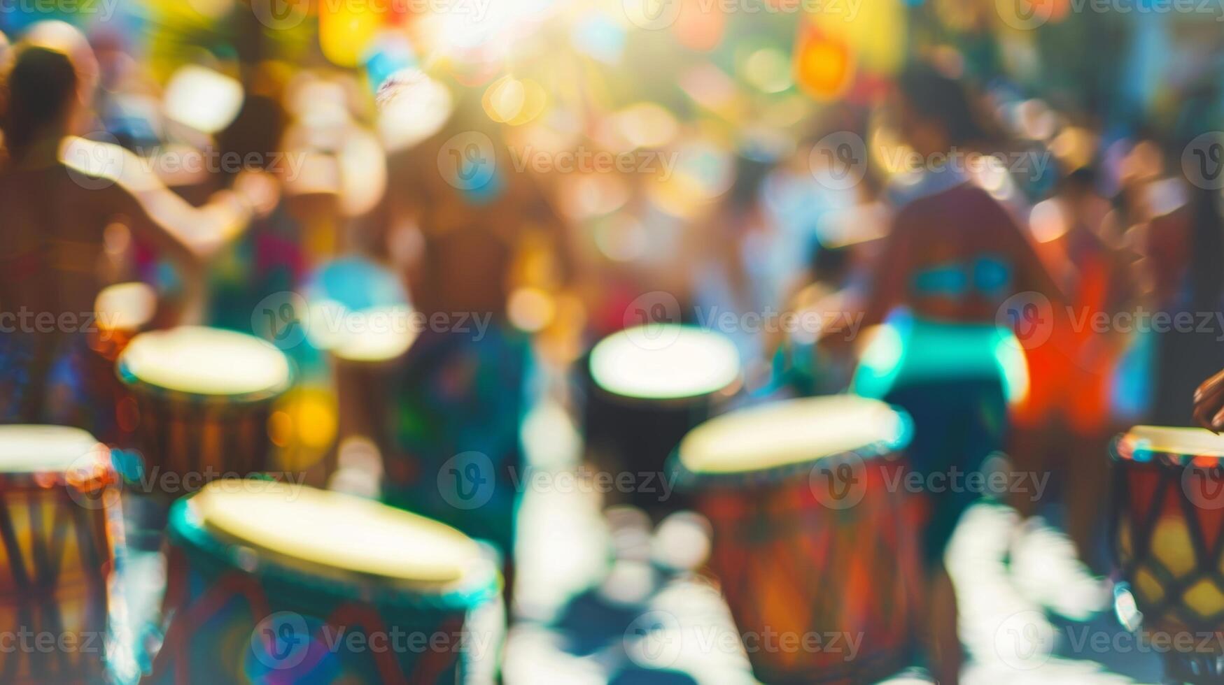 Defocused view of a sea of people swaying to the sounds of drums and flutes in a vibrant outdoor cultural dance event photo