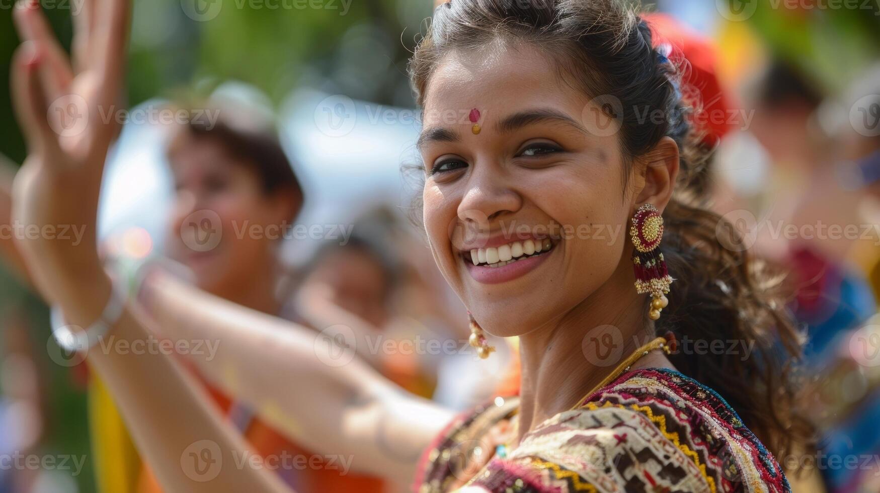 The sound of laughter and chatter fills the air as people come together to embrace the spirit of community and cultural pride at the local food festival photo