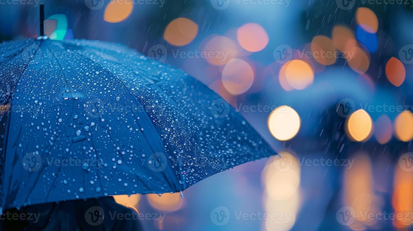 Defocused Umbrellas in the Rain A soft and blurred background of people walking under umbrellas in the rain adds to the coziness of a rainy evening. photo
