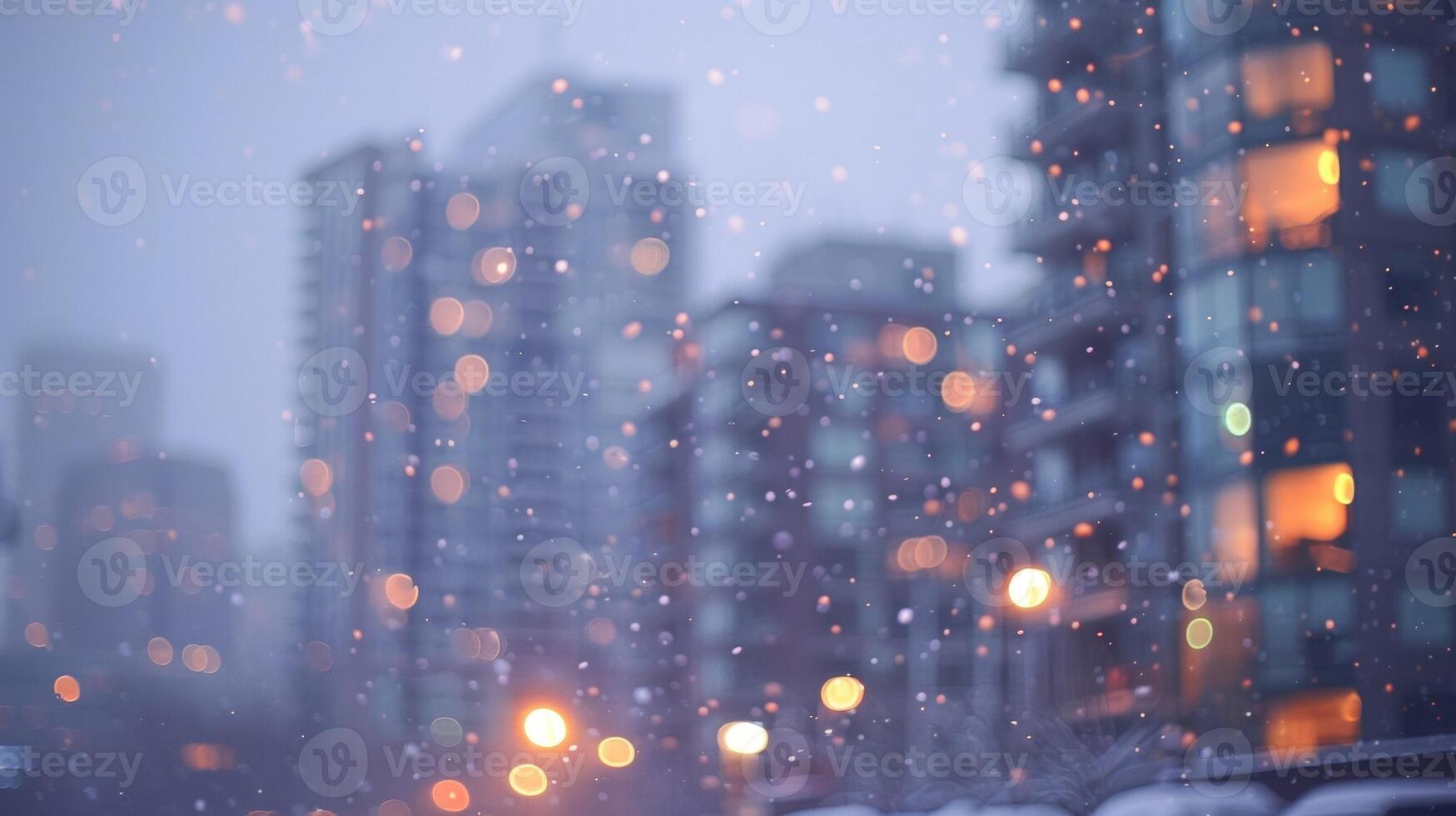 Softly blurred skysers stand tall in a wintery urban scene the glow of distant windows inviting in the cold night air. photo