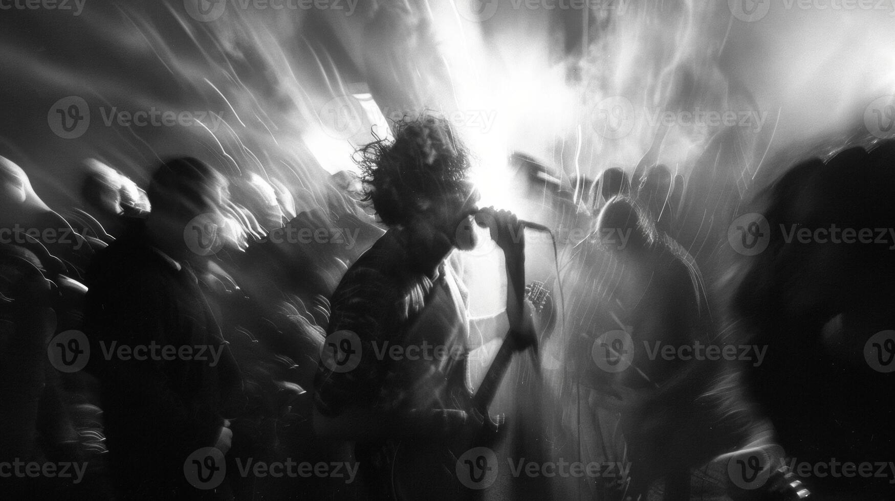 The gritty atmosphere of a punk concert captured through blurred edges and outoffocus visuals mirrors the high energy and intensity of the show. photo