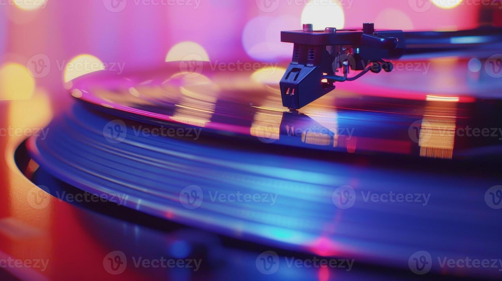 A closeup of a needle on a turntable playing a newly pressed record and producing the warm rich sound that vinyl is known for photo