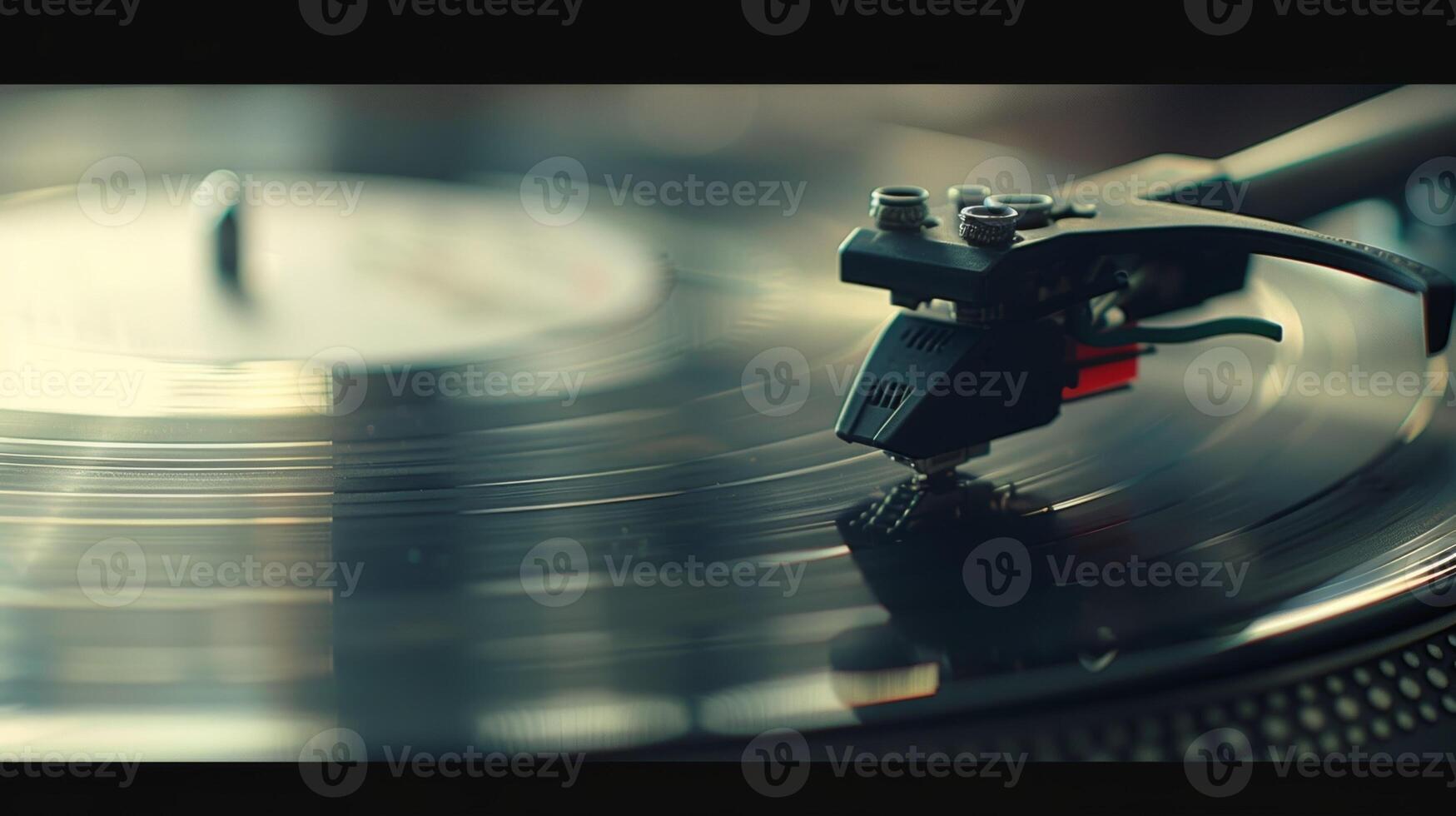 Closeup of a record player displaying the intricate grooves of a vinyl record as it spins and plays music for a theutic session photo