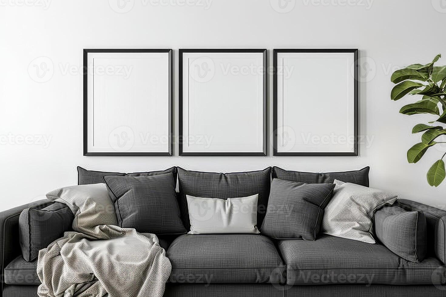 Three Posters interior mockup. Frame mockup in scandinavian interior with grey sofa with pillows and green plant photo