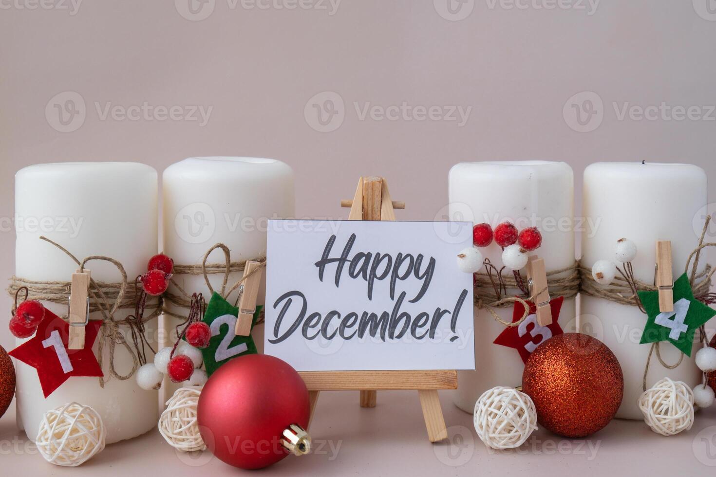 Greeting card with text HAPPY DECEMBER New year and Christmas preparation. Four-week advent candles on table. Handmade eco-friendly decor. Sustainable Christmas decoration. Postcard photo