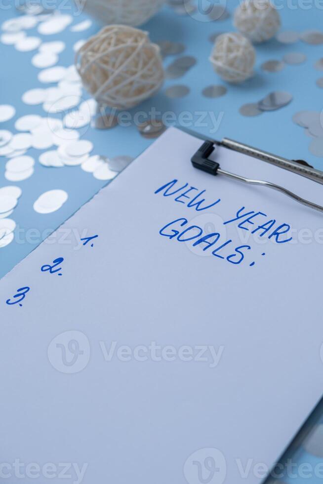 Handwritten promises and aims. Preparation for new year new life new me. Visualizing wish list for 2025. Dreams plan action resolutions for coming year. Inspirational self improvement concept photo