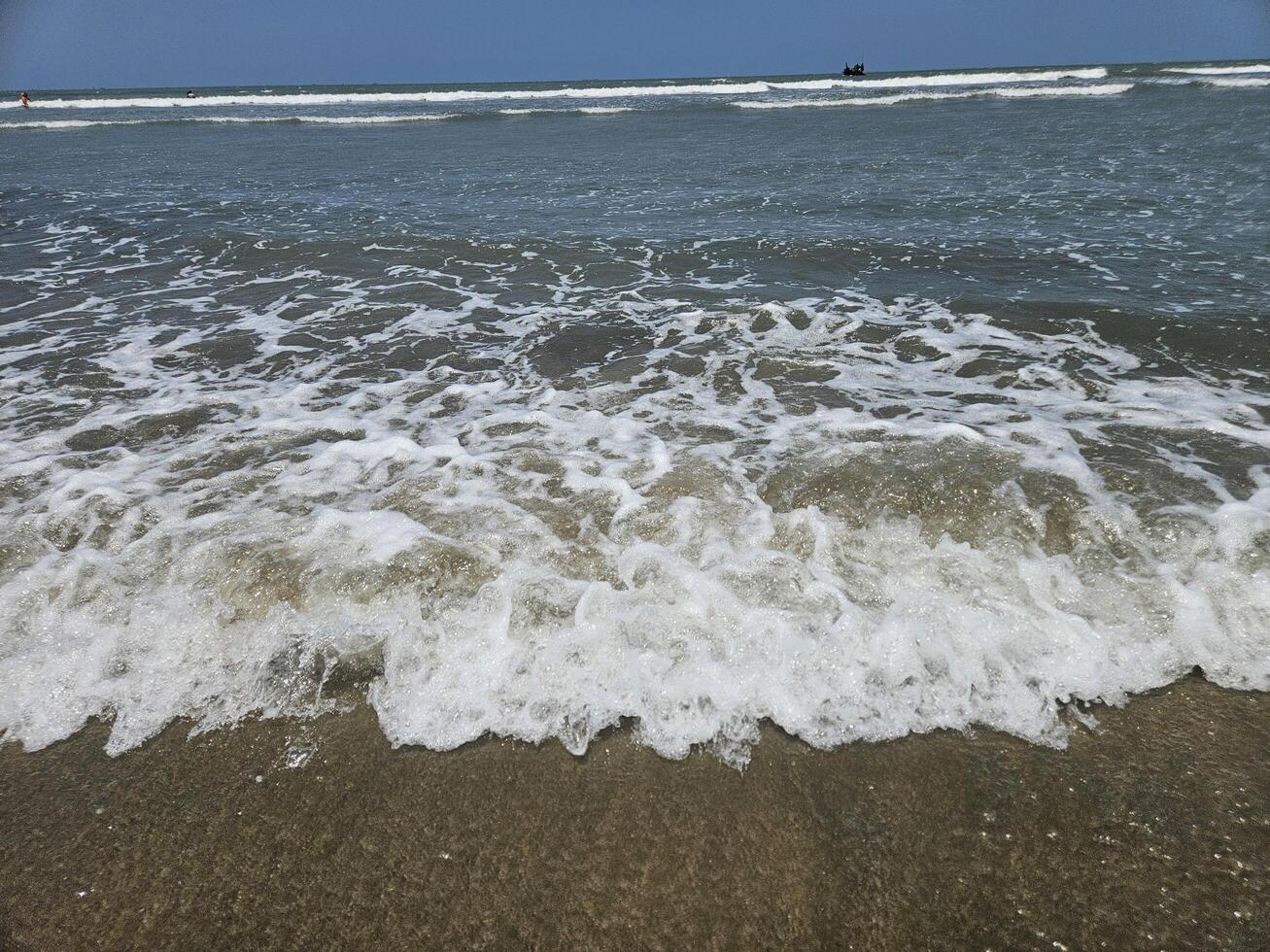 Beautiful beach with sea waves photo
