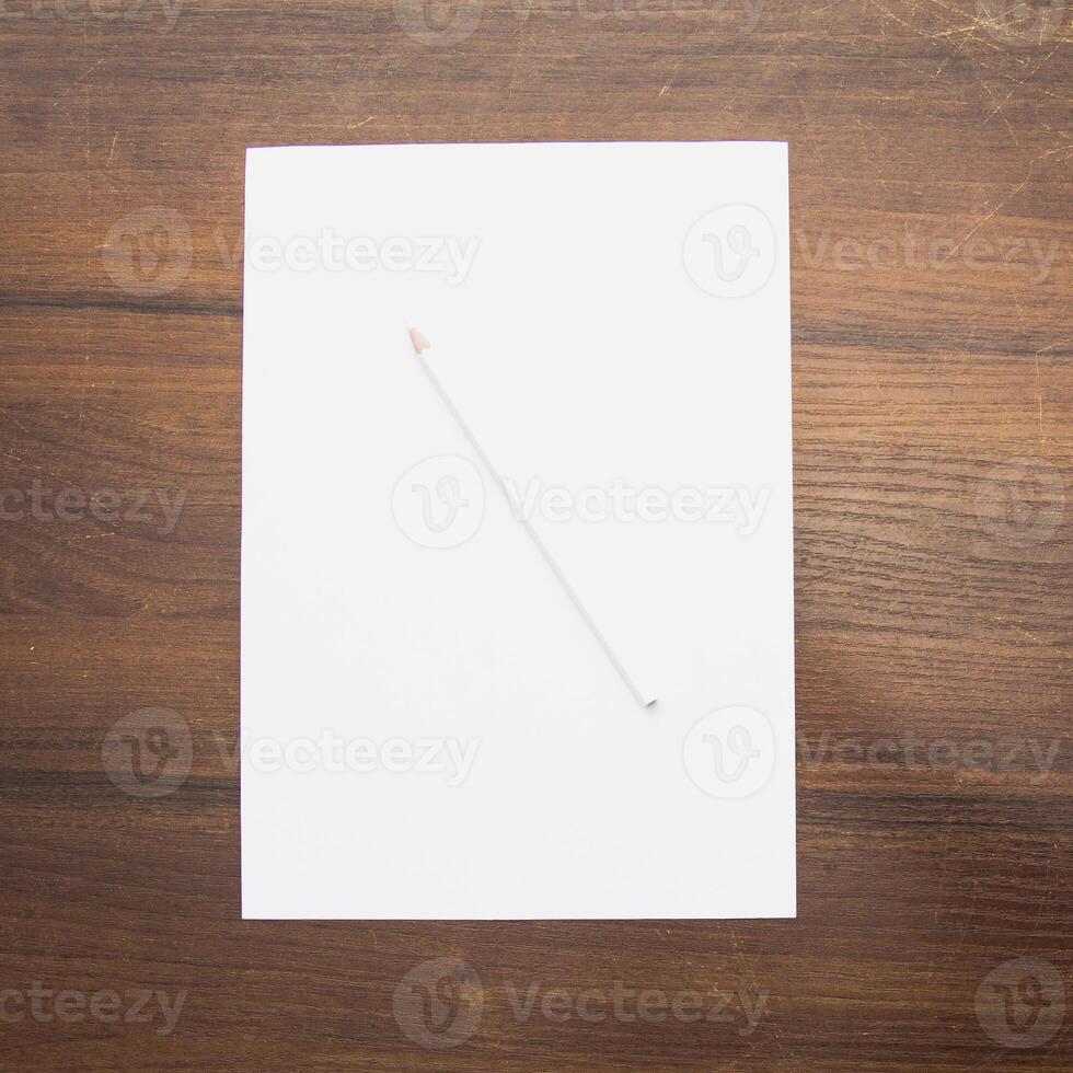 Notebook and pencil on a beautiful background in a large photo studio