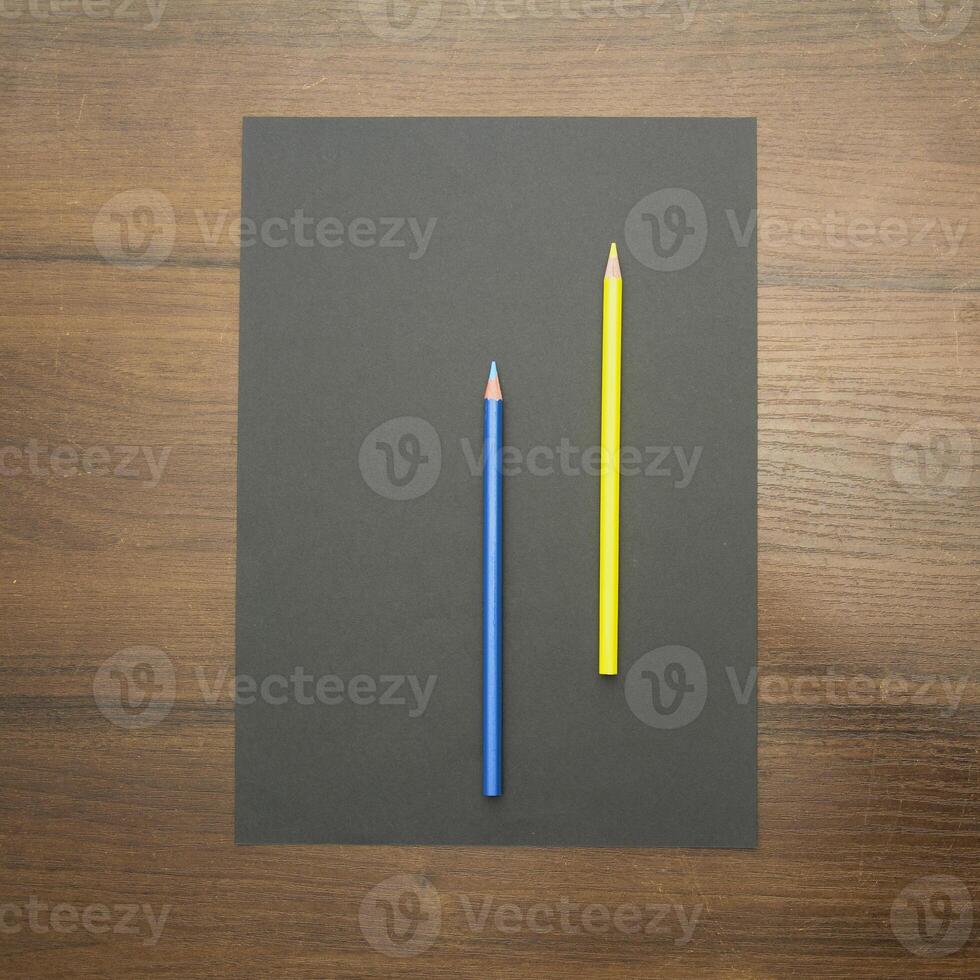 Notebook and pencil on a beautiful background in a large photo studio