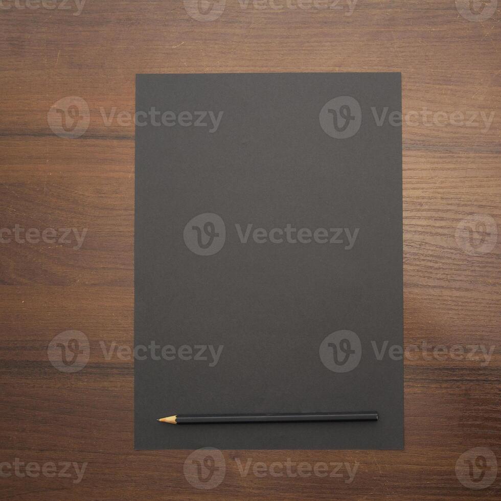 Notebook and pencil on a beautiful background in a large photo studio