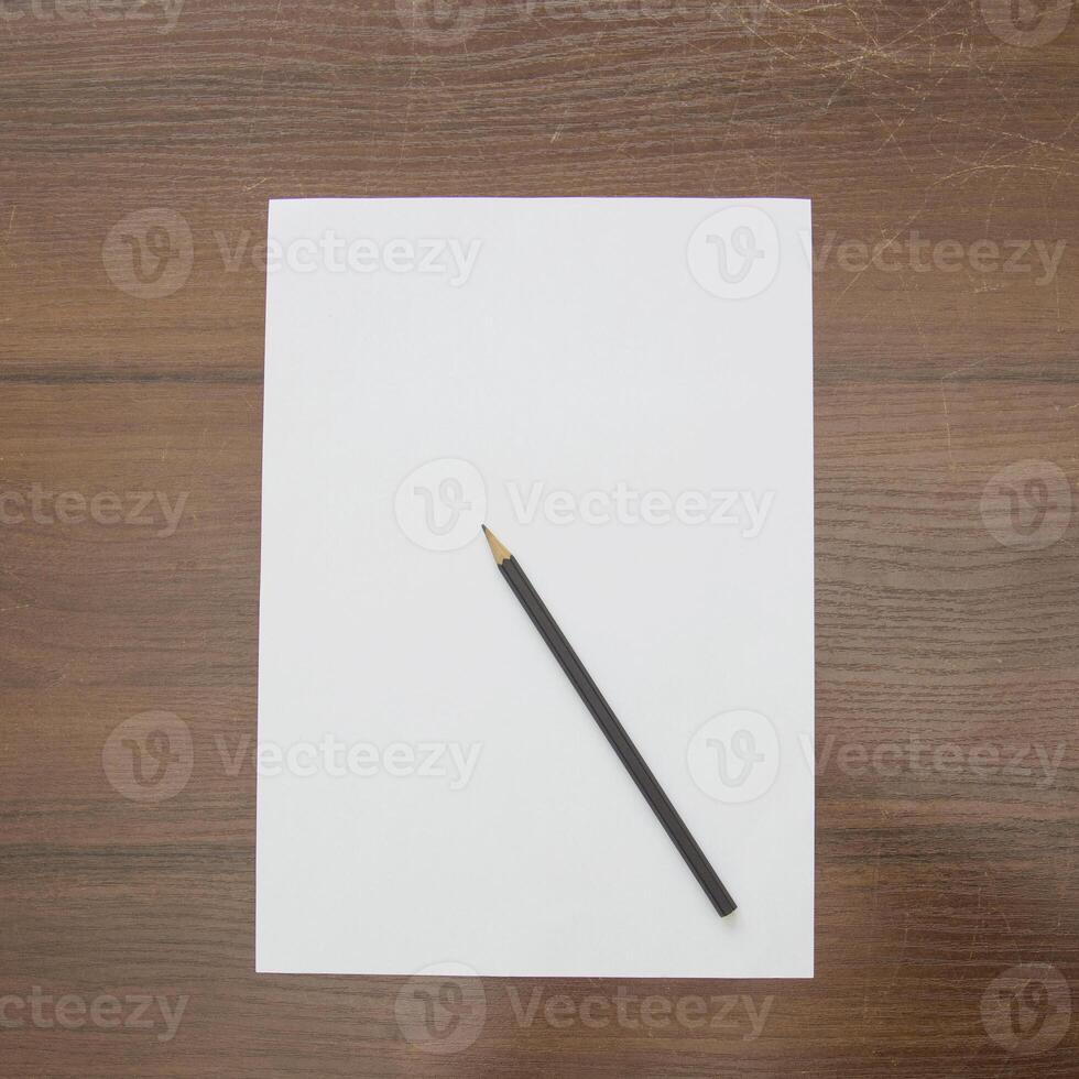 Notebook and pencil on a beautiful background in a large photo studio