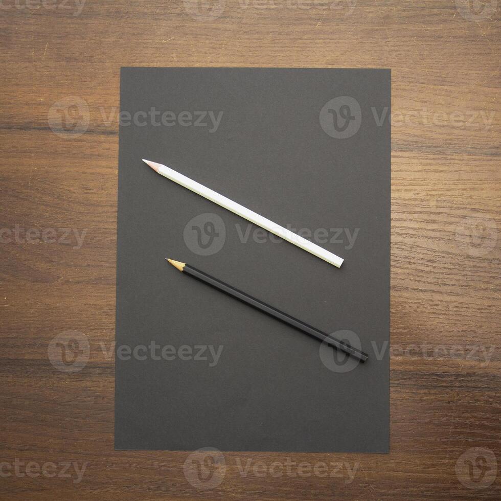 Notebook and pencil on a beautiful background in a large photo studio