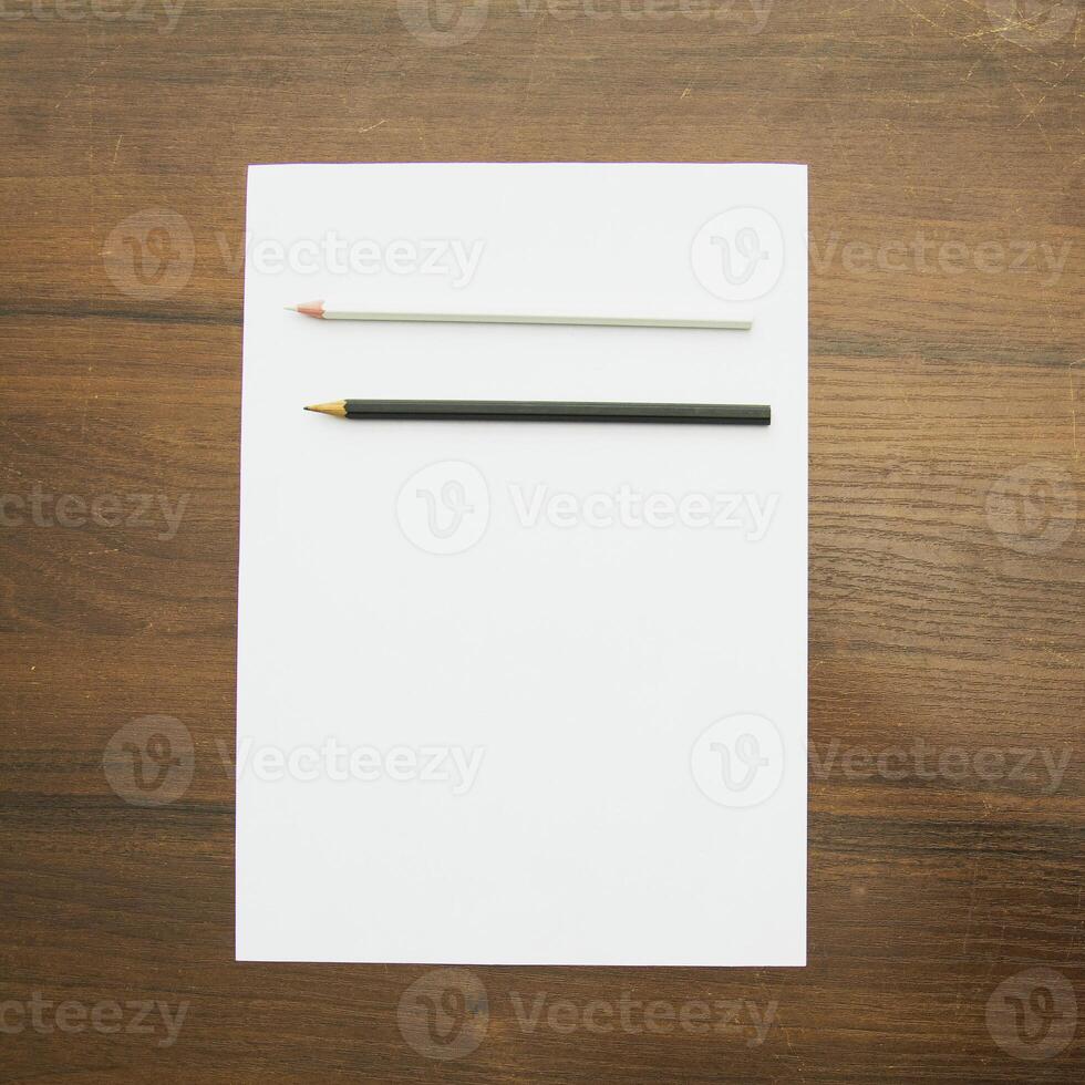 Notebook and pencil on a beautiful background in a large photo studio