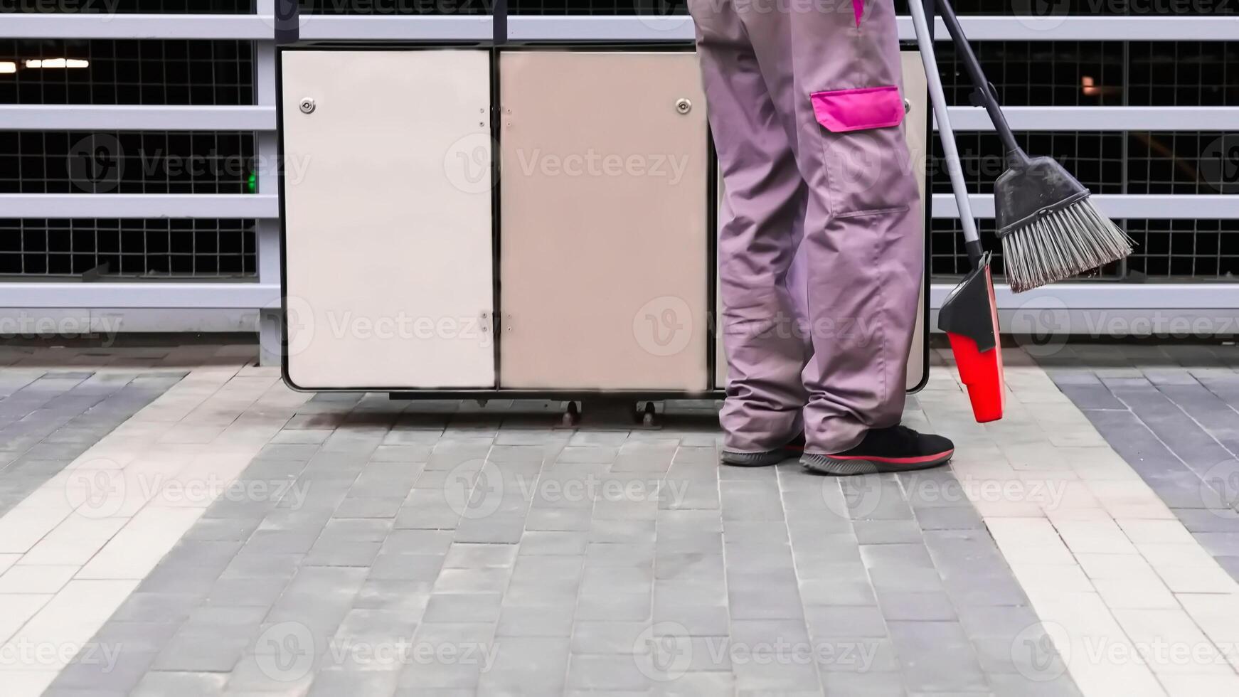Waste containers and janitors feet, keep your planet Earth clean photo