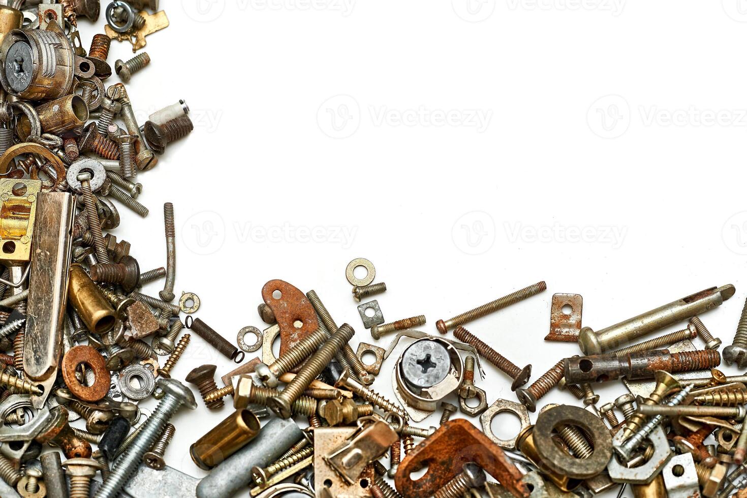 Iron small metal trash. Lots of different nuts, bolts, washers photo