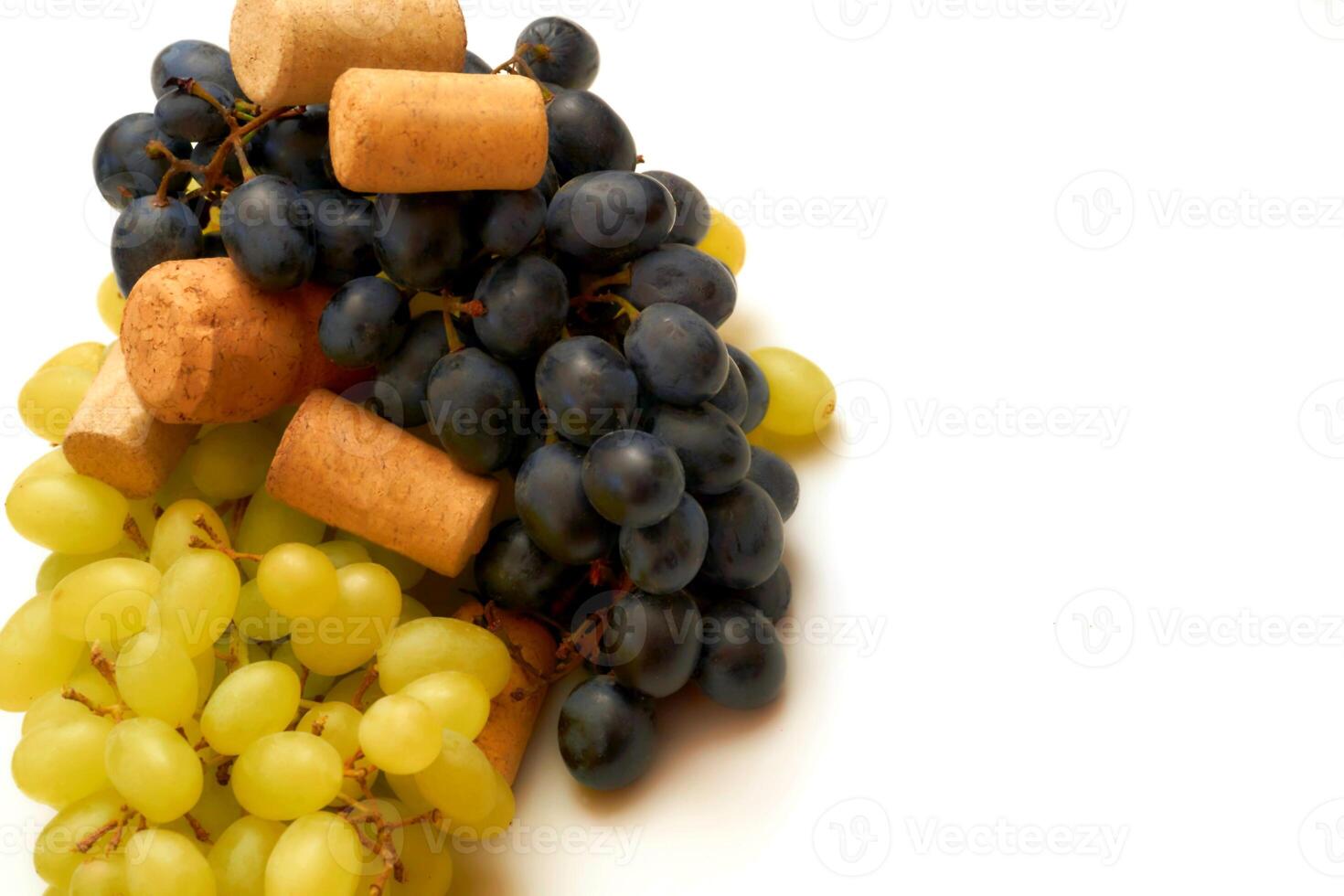 Wine stopper. Good old brandy, cognac,wine, black ripe grapes photo