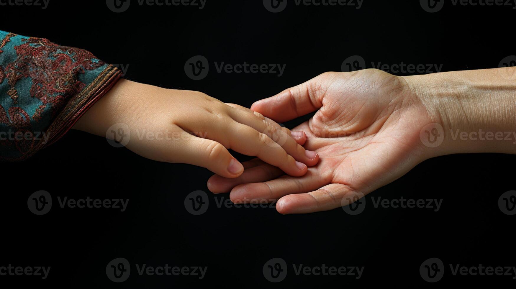 Mother hand holding the child hand support parent trust together photo