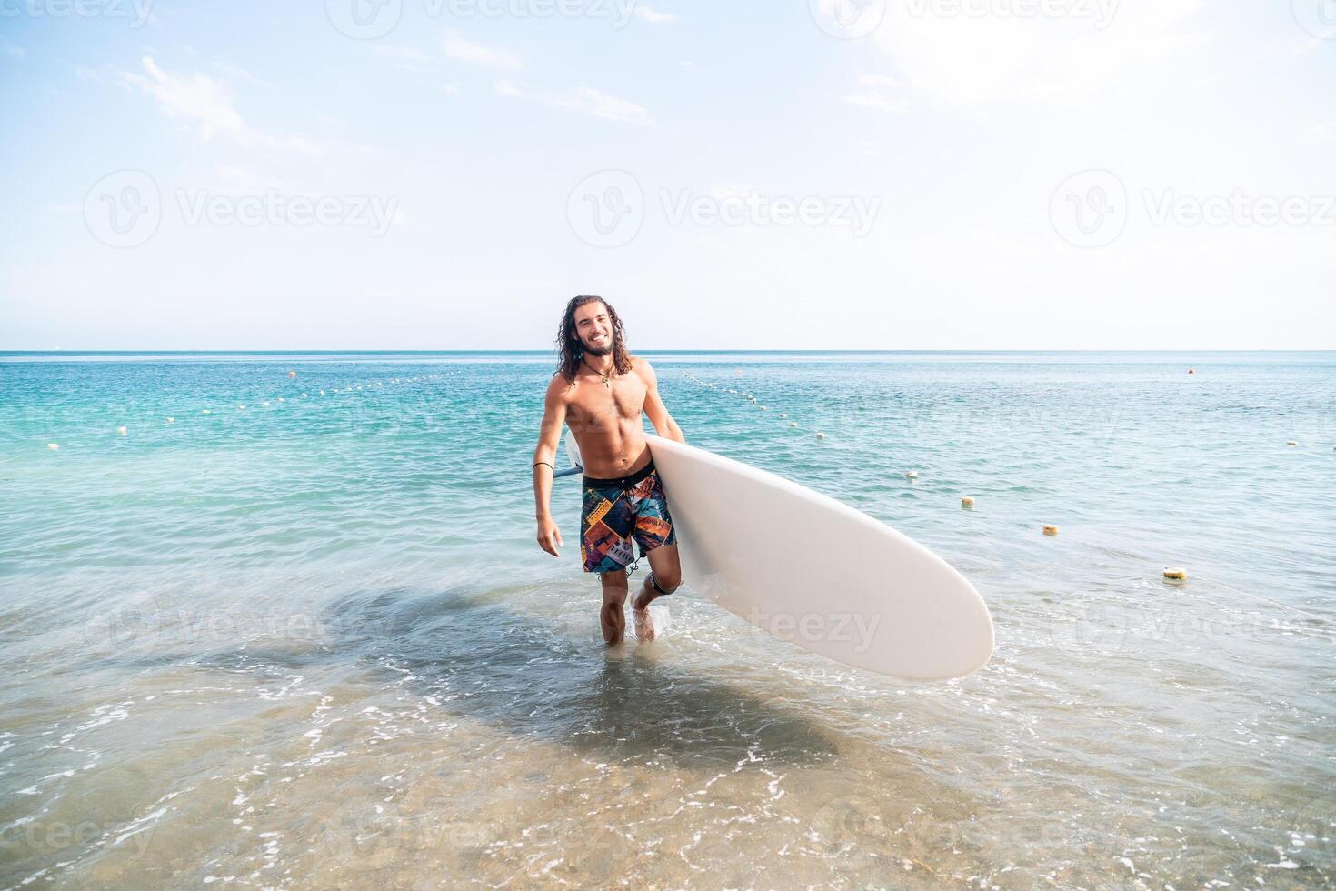 Sea man sup. Asian athlete man swimming in sea and paddleboarding at summer sunset. Healthy strong male enjoy outdoor active lifestyle and water sports on holiday vacation. photo