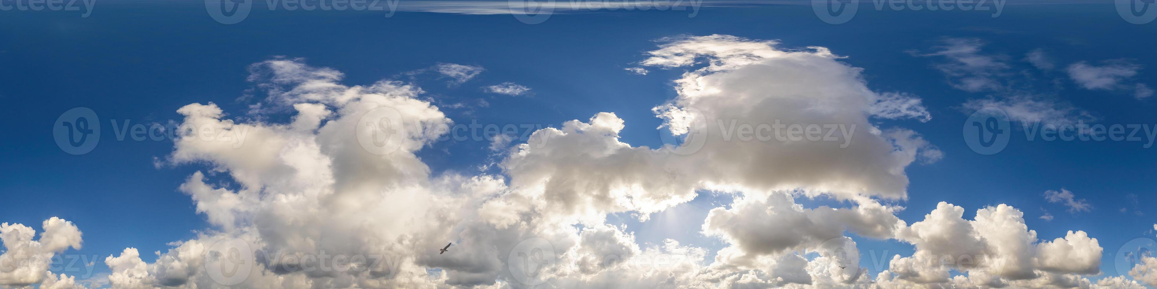 Blue sky panorama with puffy Cumulus clouds. Seamless hdr pano in spherical equirectangular format. Sky dome or zenith for 3D visualization, game and sky replacement for aerial drone 360 panoramas. photo