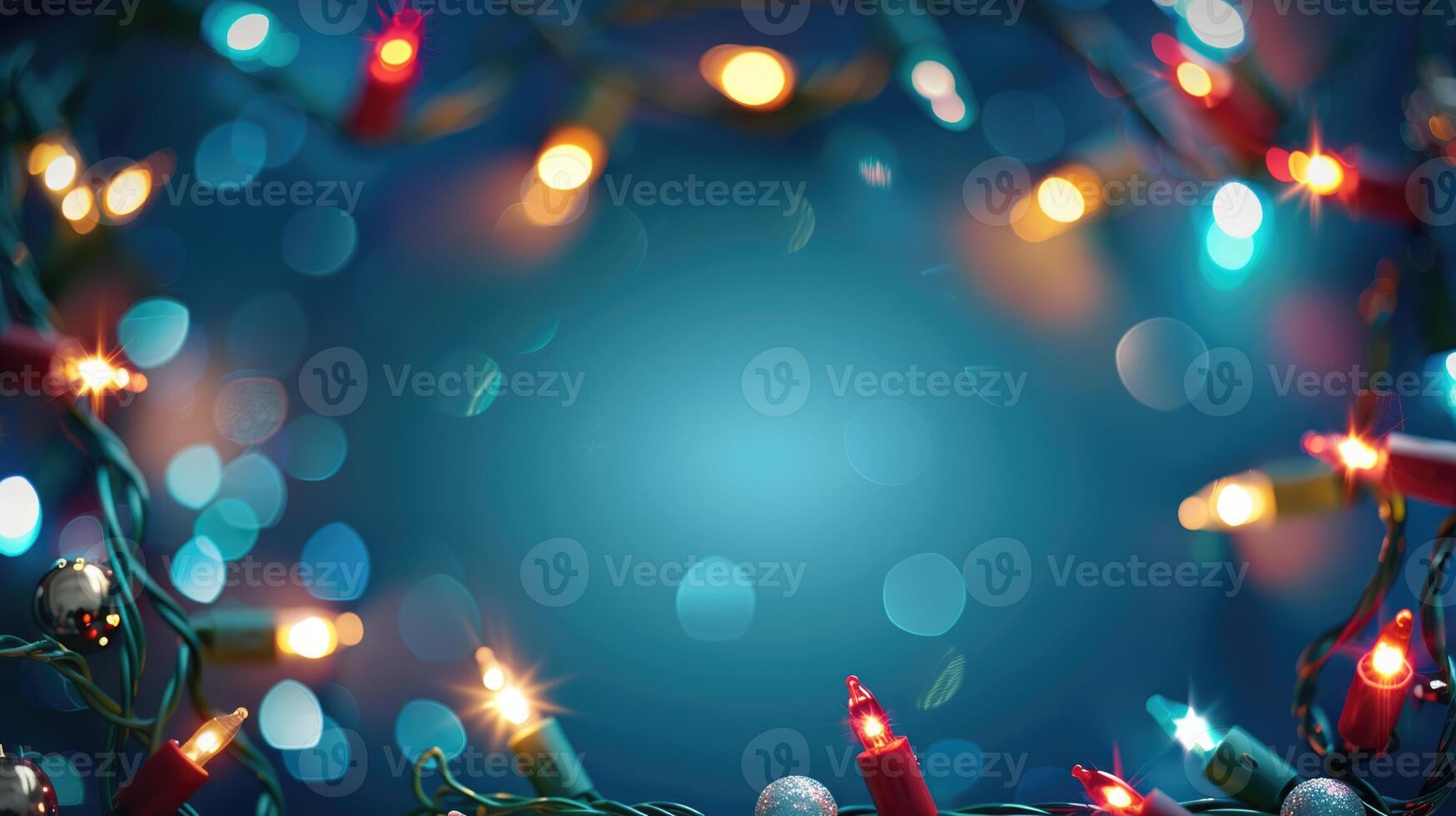 Christmas frame banner with sparkling light garland and copy space for text on blue background photo