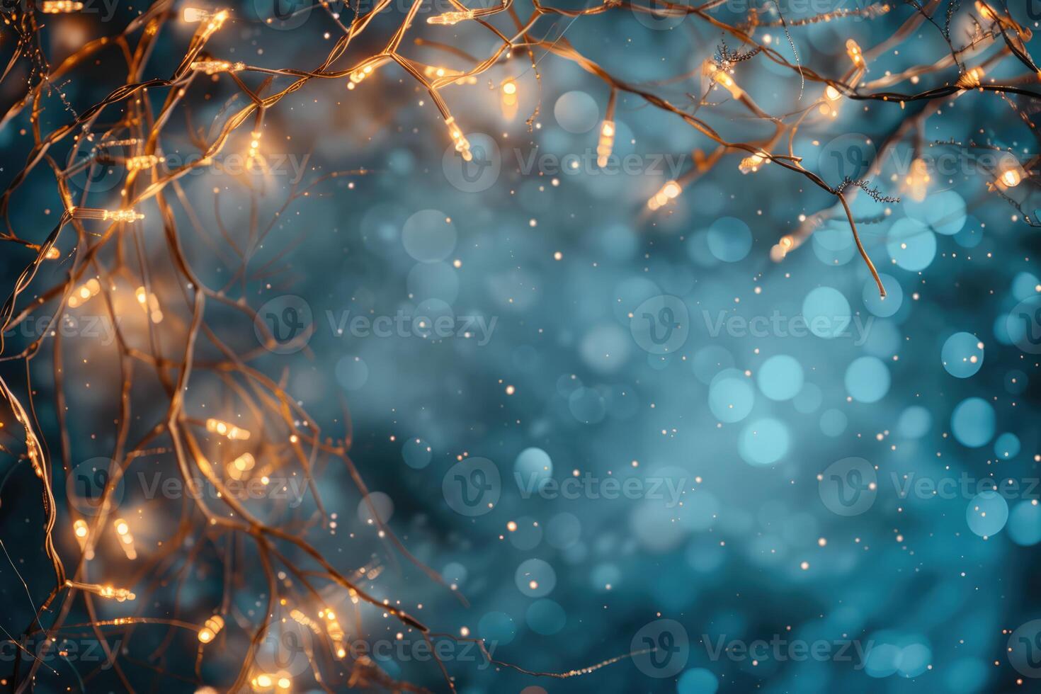 Christmas frame banner with sparkling light garland and copy space for text on blue background photo