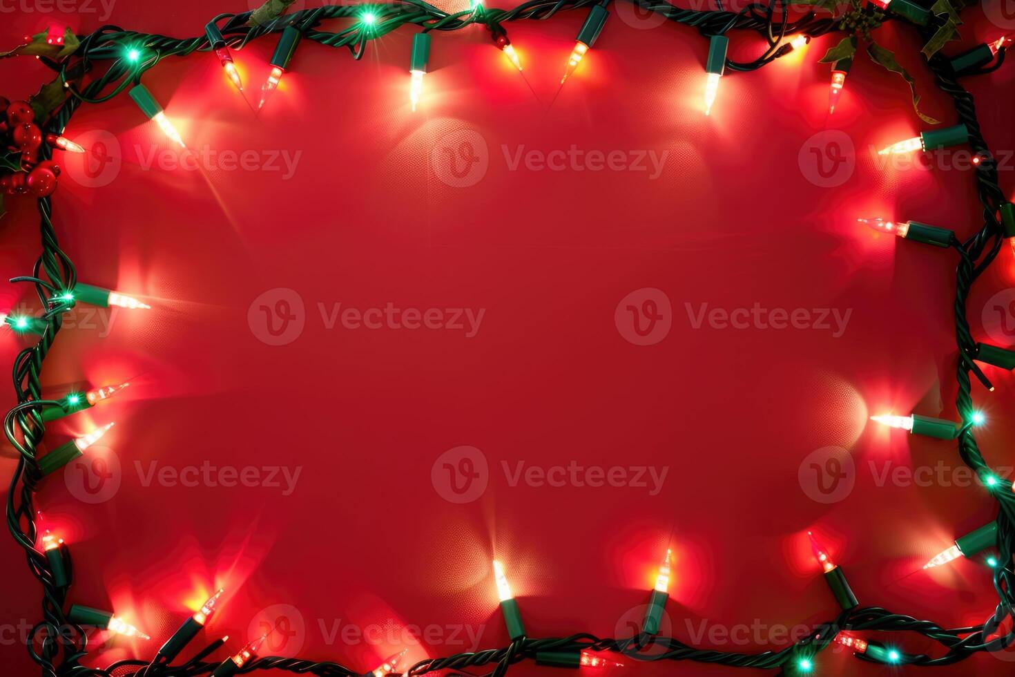 Christmas frame banner with sparkling light garland and copy space for text on red background photo