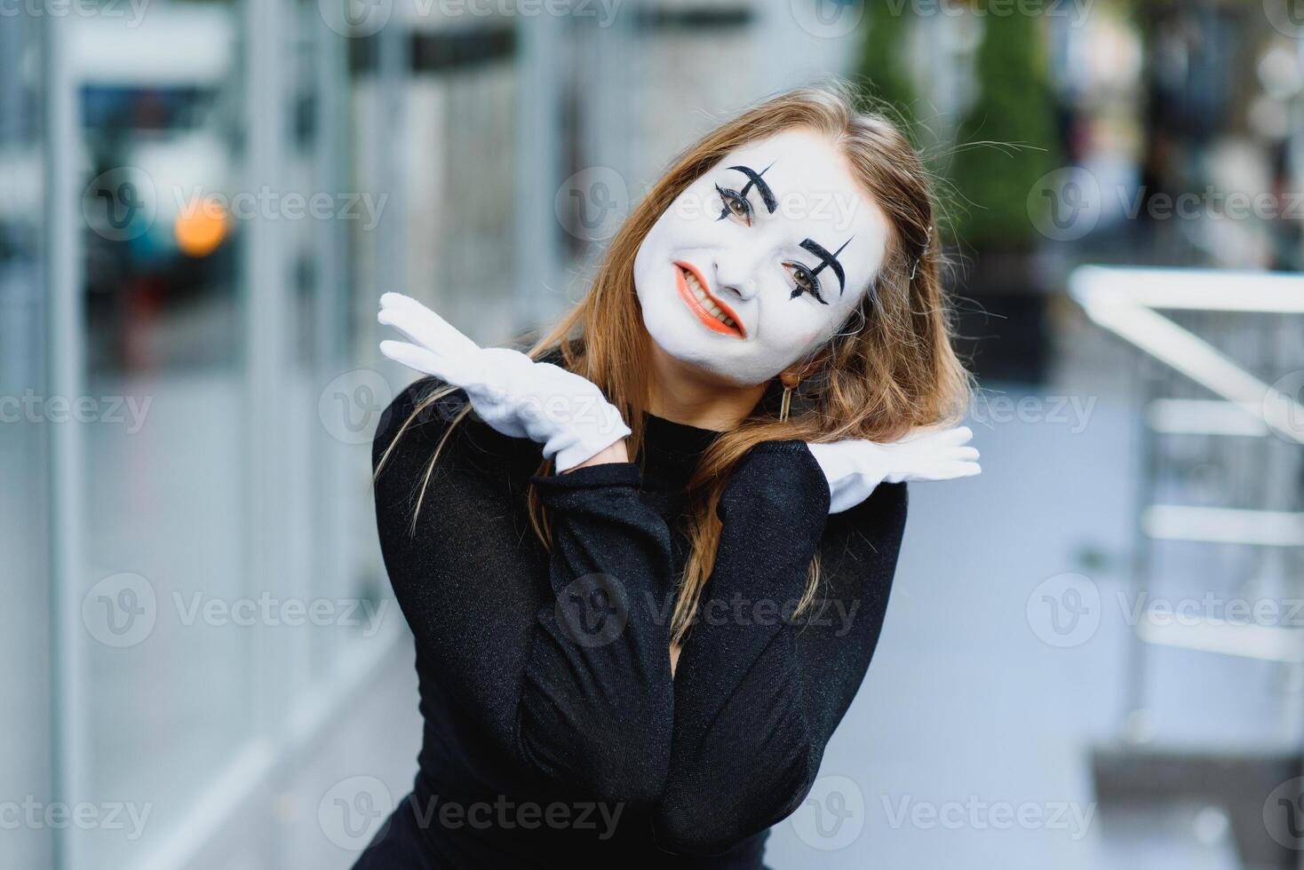 The girl with makeup of the mime. improvisation. photo