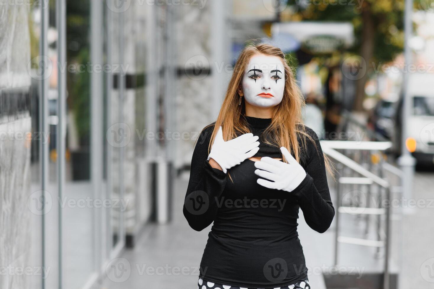 The girl with makeup of the mime. improvisation. photo