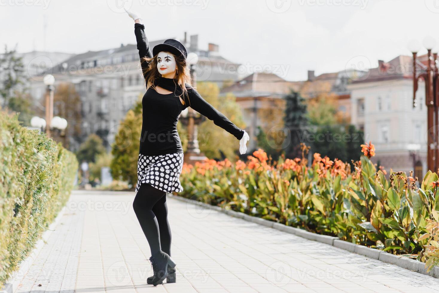 The girl with makeup of the mime. improvisation. mime shows different emotions photo