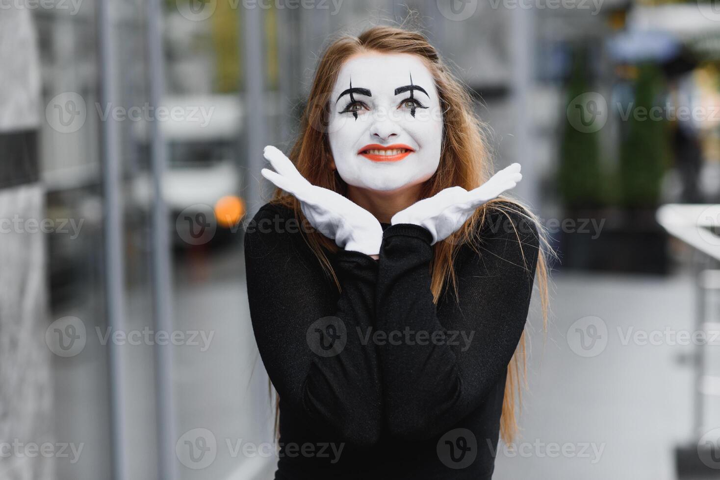 The girl with makeup of the mime. improvisation. photo