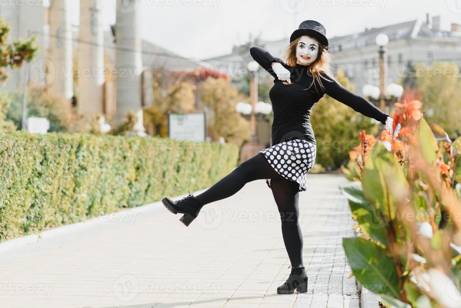 The girl with makeup of the mime. improvisation. mime shows different emotions photo