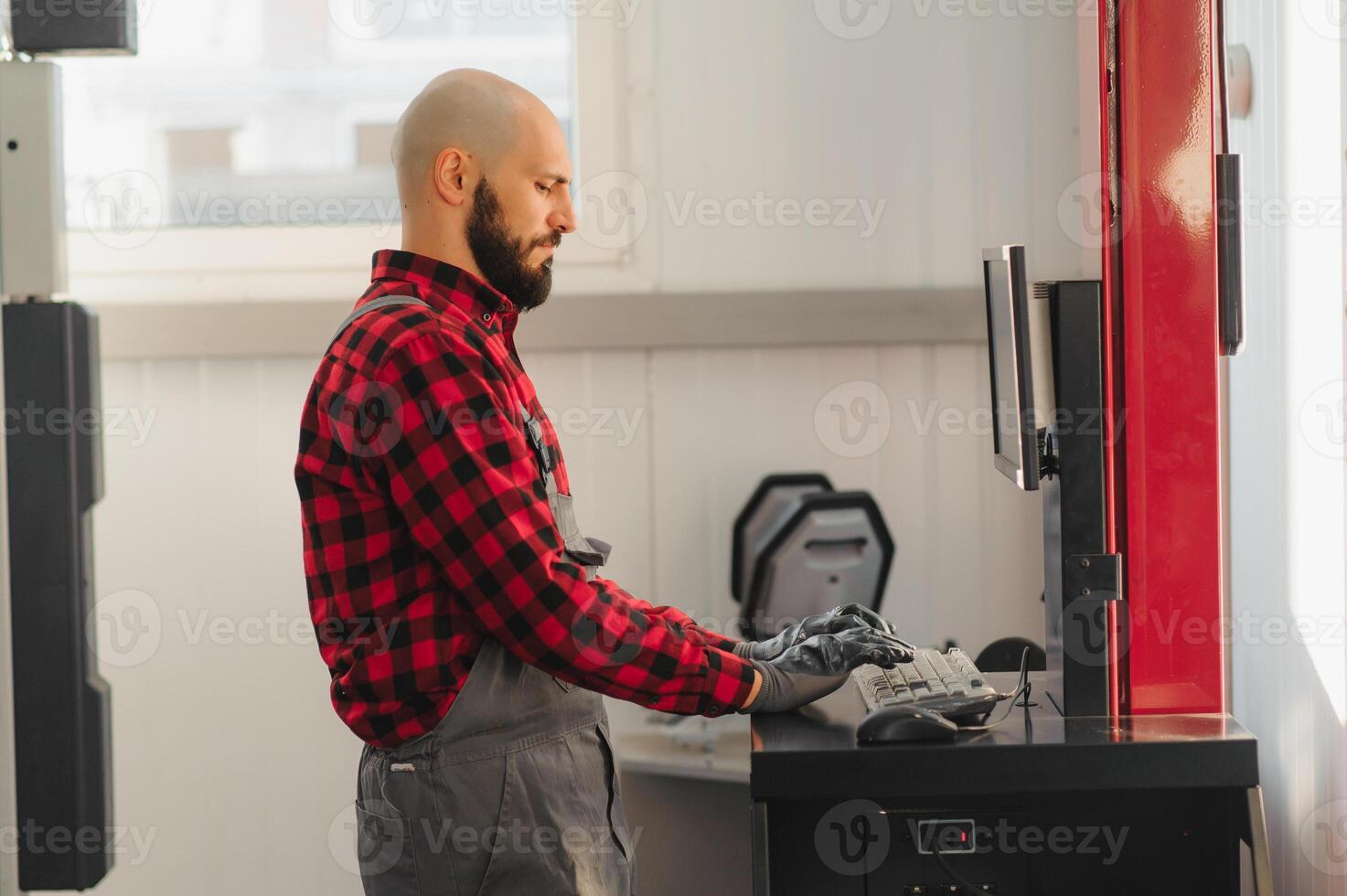 working process of a full system diagnostic scanner that can quickly test every system module s status and make faster diagnosis. mechanic makes computer diagnostics of the car photo