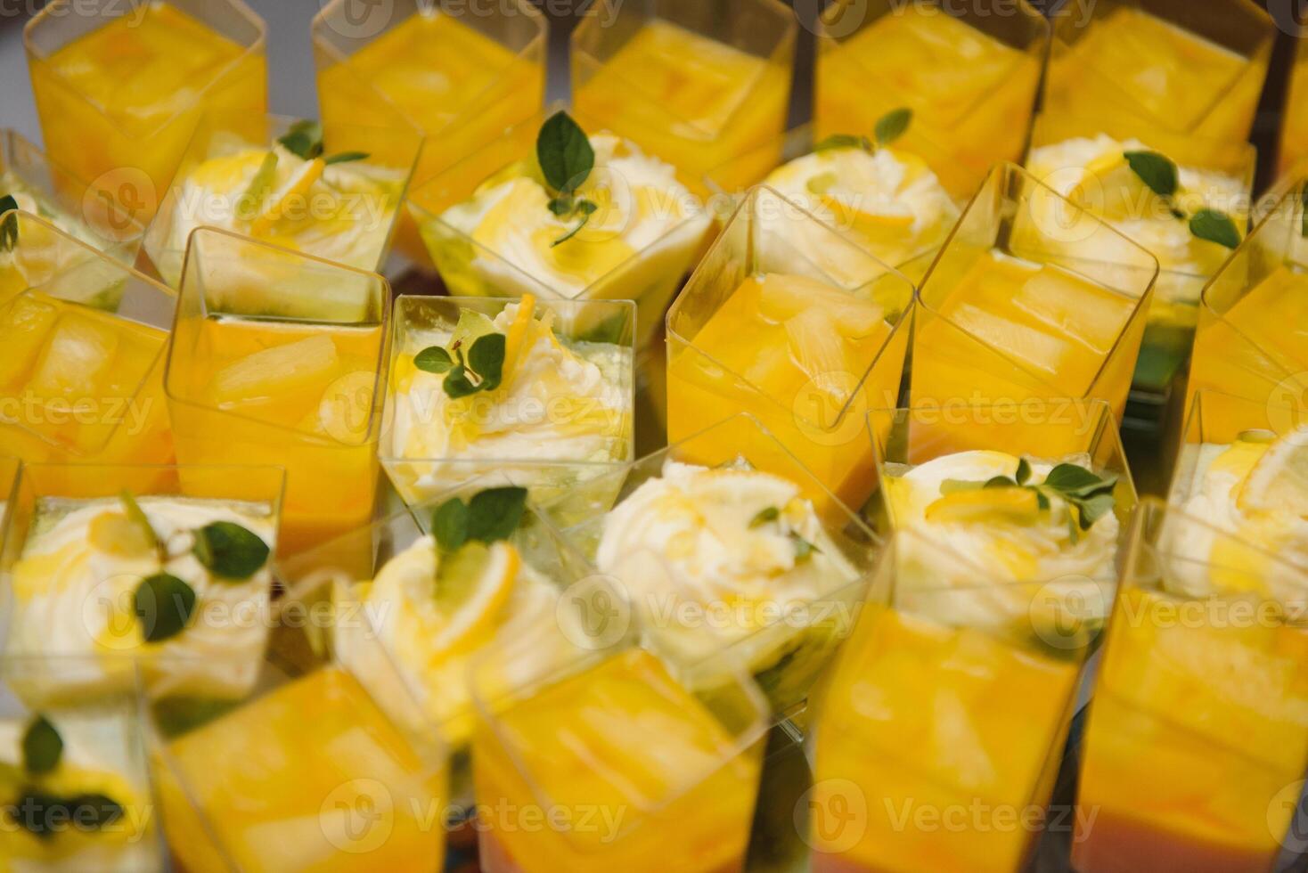 Delicious sweets on wedding candy buffet with desserts, cupcakes,tiramisu and cookies photo