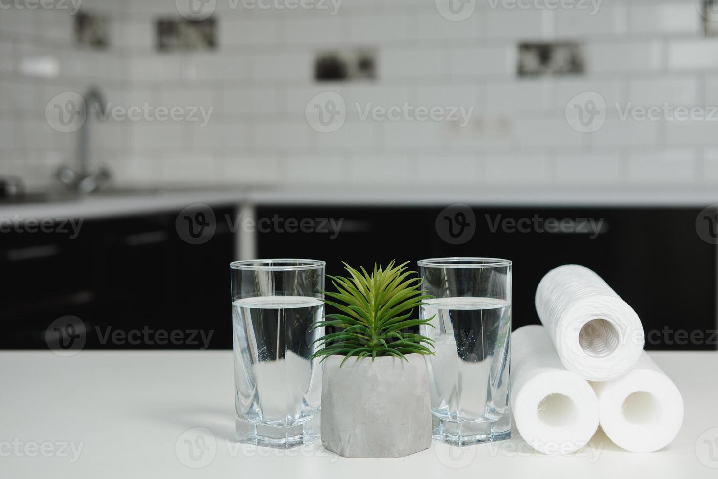 Water purifier cartridge and clean water. Home water purifier system concept. photo